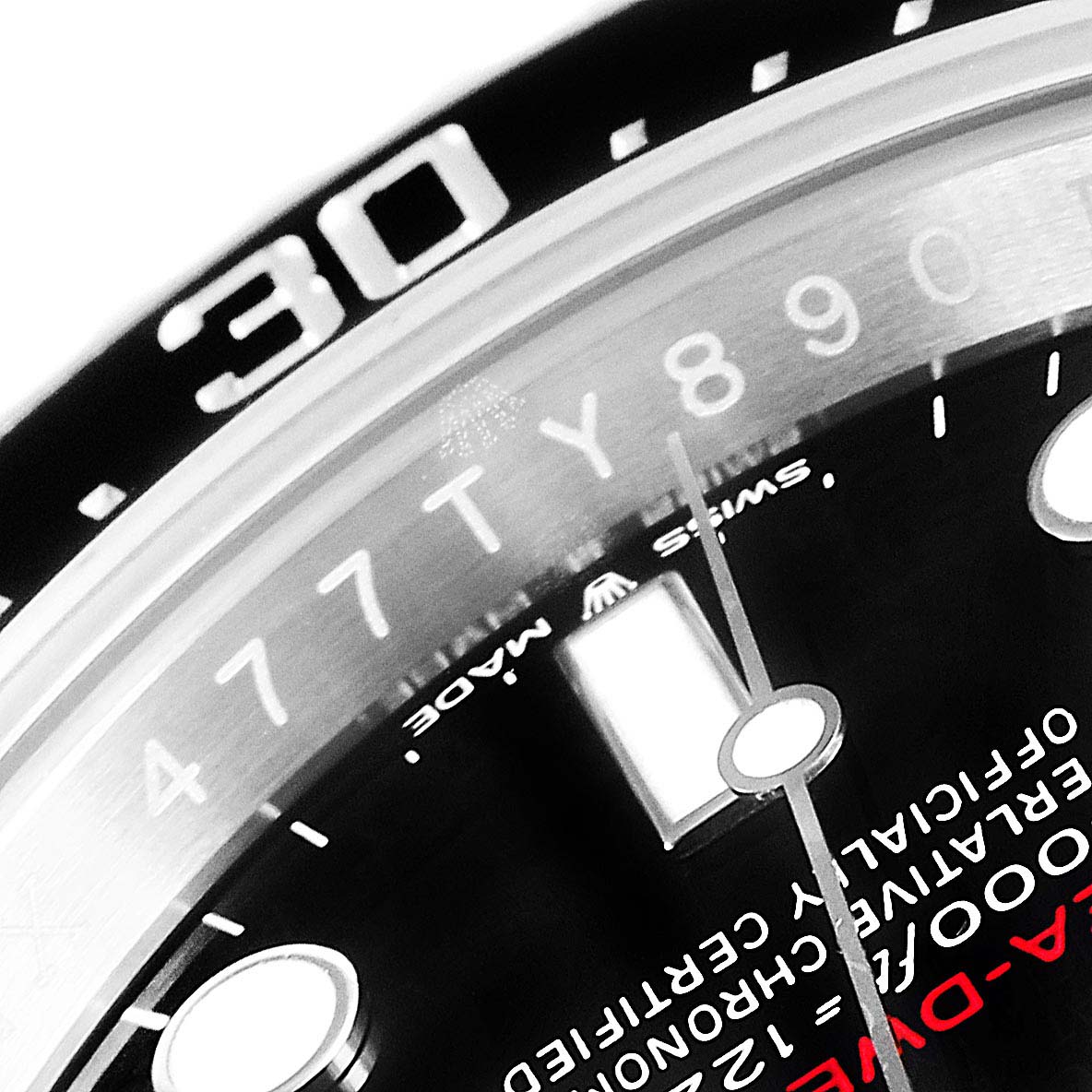 This close-up angle of the Rolex Sea-Dweller 126600 Men
s Stainless Steel Black Dial 126600 Men
s Stainless Steel Black Dial model shows parts of the bezel, dial, and minute hand.