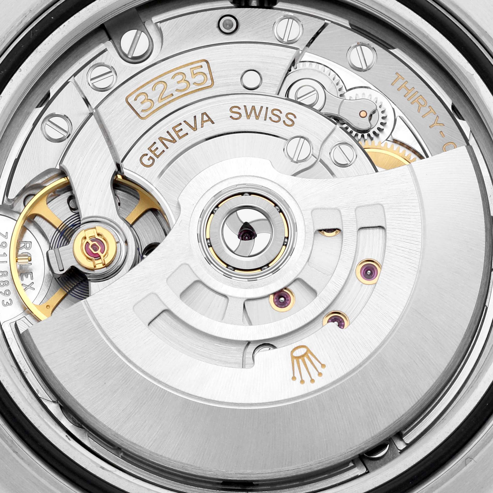 This image shows a close-up of the movement mechanism of a Rolex Sea-Dweller 126603 Men
s Steel and Gold (two tone) Black Dial 126603 Men
s Steel and Gold (two tone) Black Dial watch, highlighting the intricate components and craftsmanship.