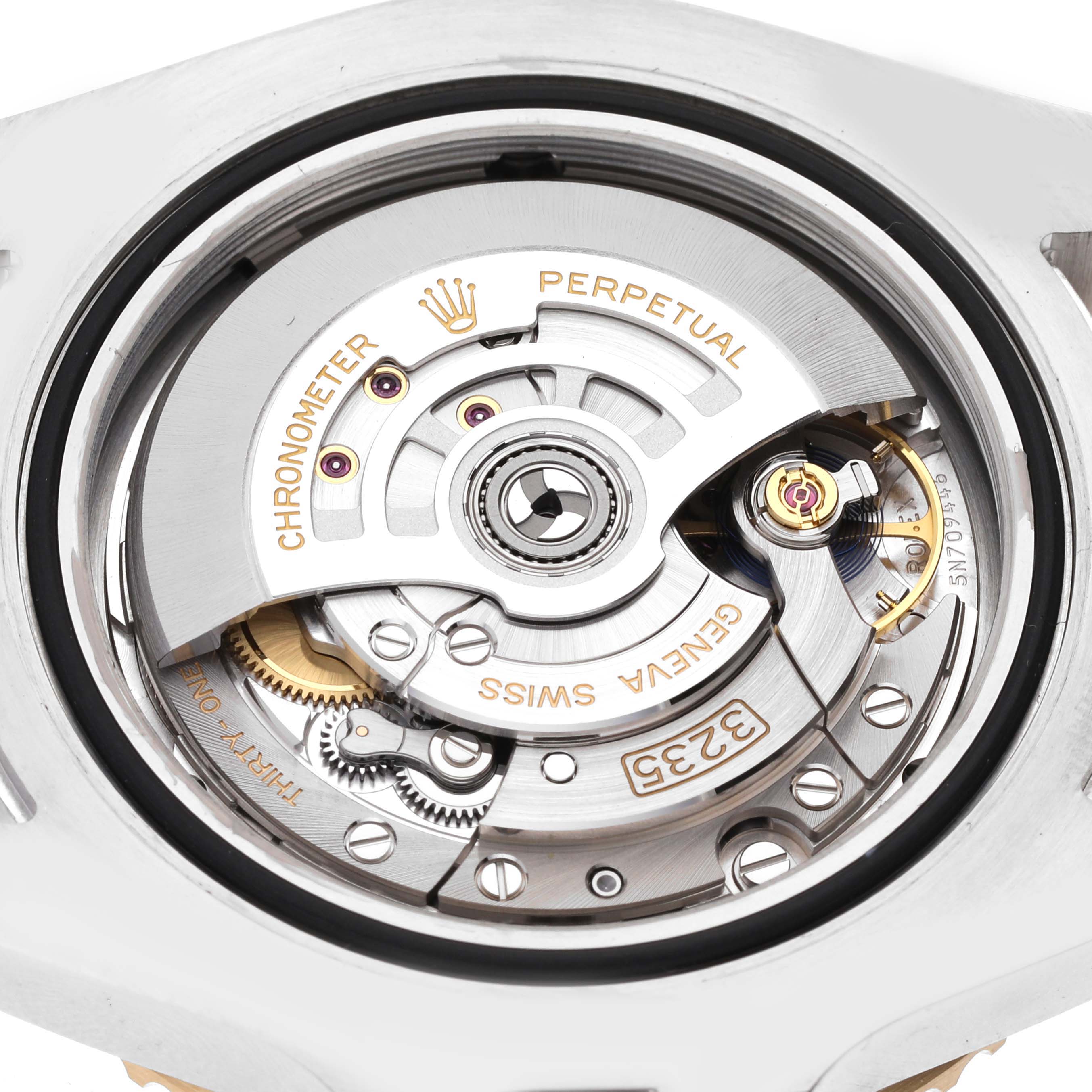 This image shows the intricate inner movement and mechanism of a Rolex Sea-Dweller 126603 Men's Steel and Gold (two tone) Black Dial 126603 Men's Steel and Gold (two tone) Black Dial watch from a top-down angle.