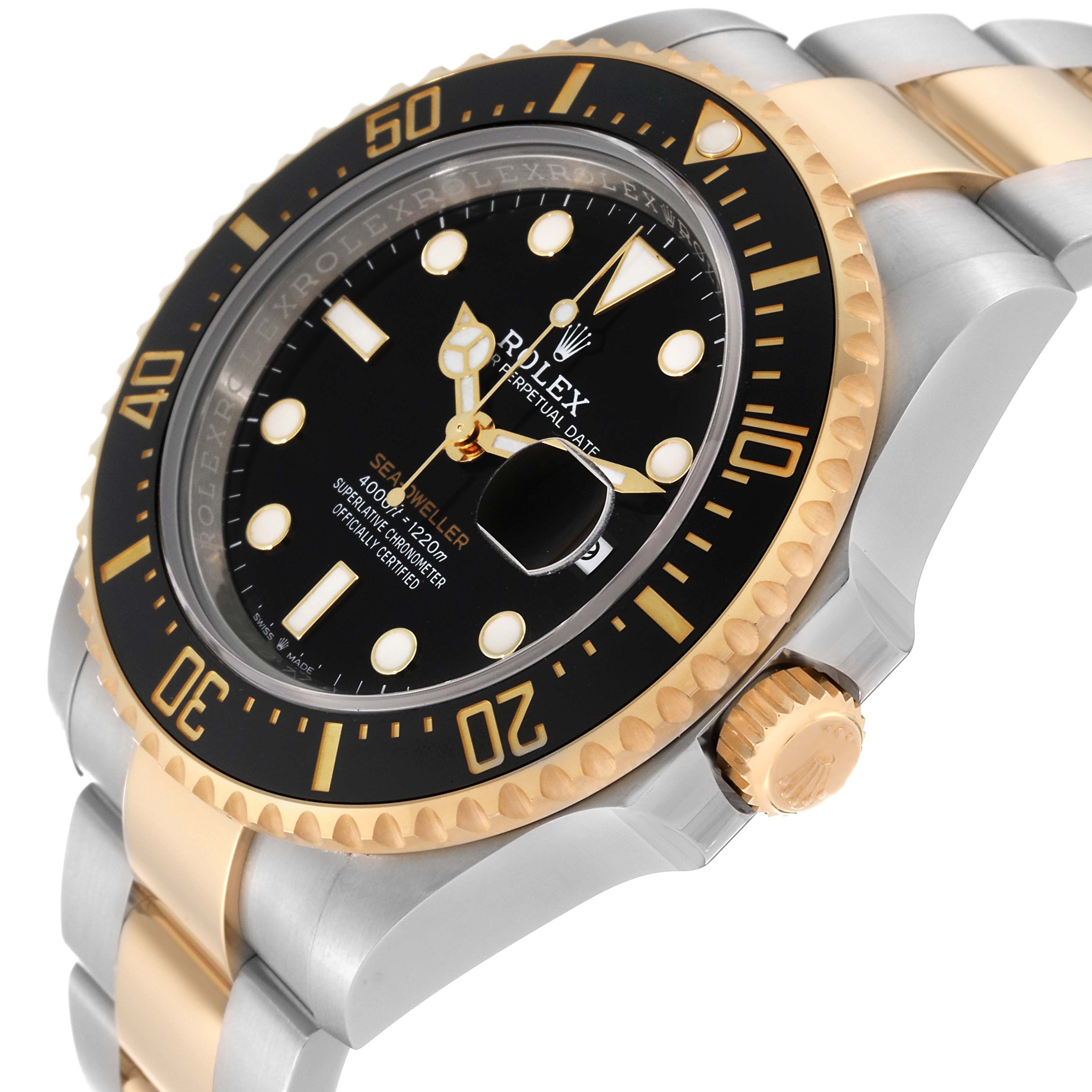 The Rolex Sea-Dweller 126603 Men's Steel and Gold (two tone) Black Dial 126603 Men's Steel and Gold (two tone) Black Dial watch is shown at an angle highlighting its black dial, gold and silver bracelet, bezel, and crown.