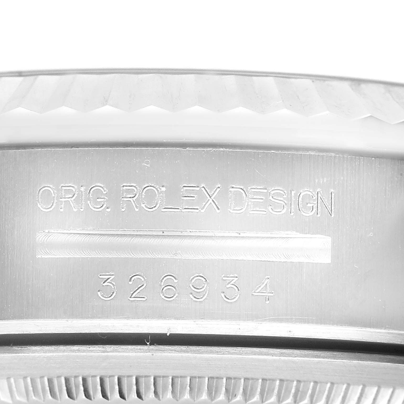 The image shows a close-up of the case side of a Rolex Sky-Dweller 326934 Men's Stainless Steel Black Dial, highlighting the "ORIG. ROLEX DESIGN" engraving and model number 326934.