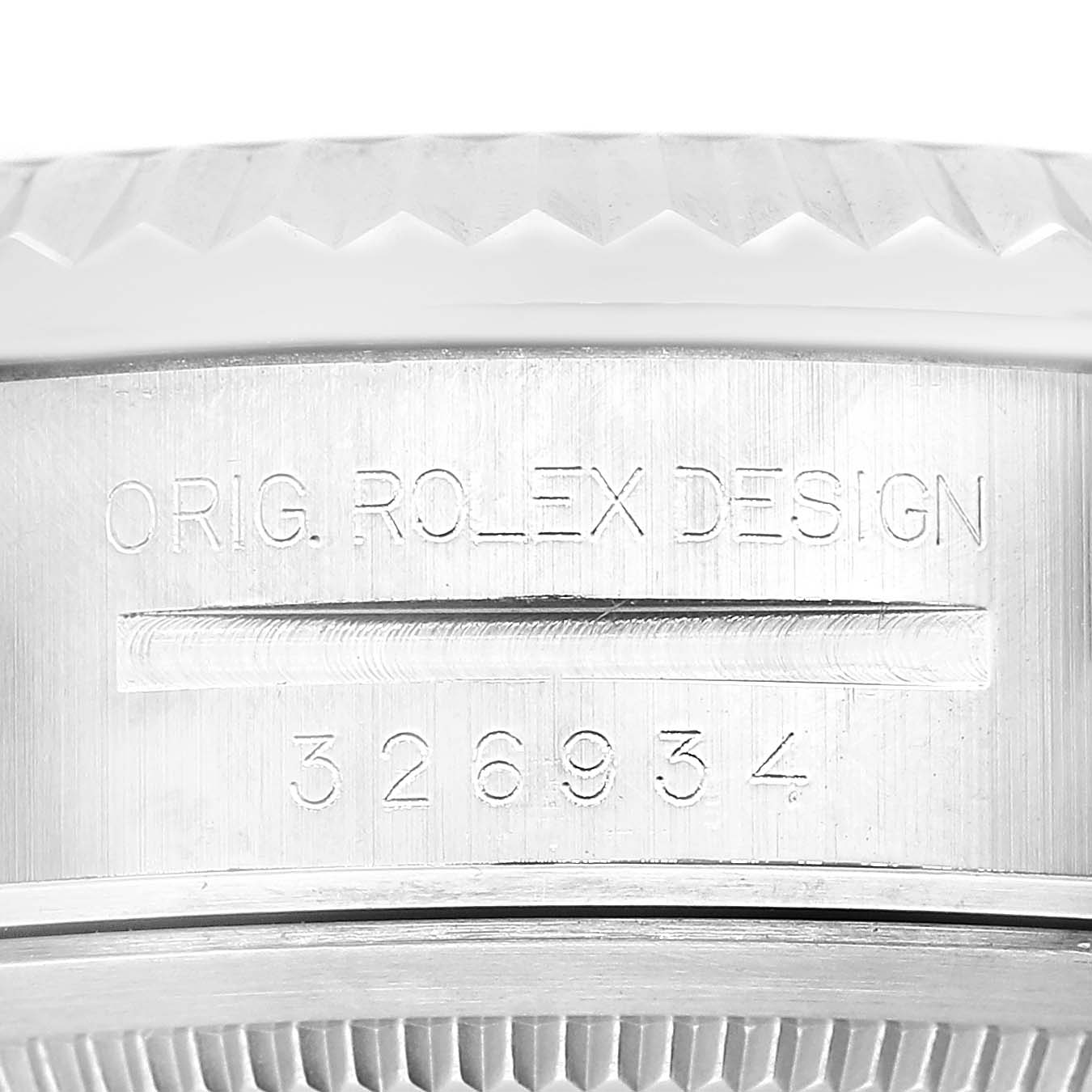 The image shows a close-up of the case side of a Rolex Sky-Dweller 336934 Men's Stainless Steel Blue Dial, featuring the engraving "ORIG. ROLEX DESIGN" and model number.