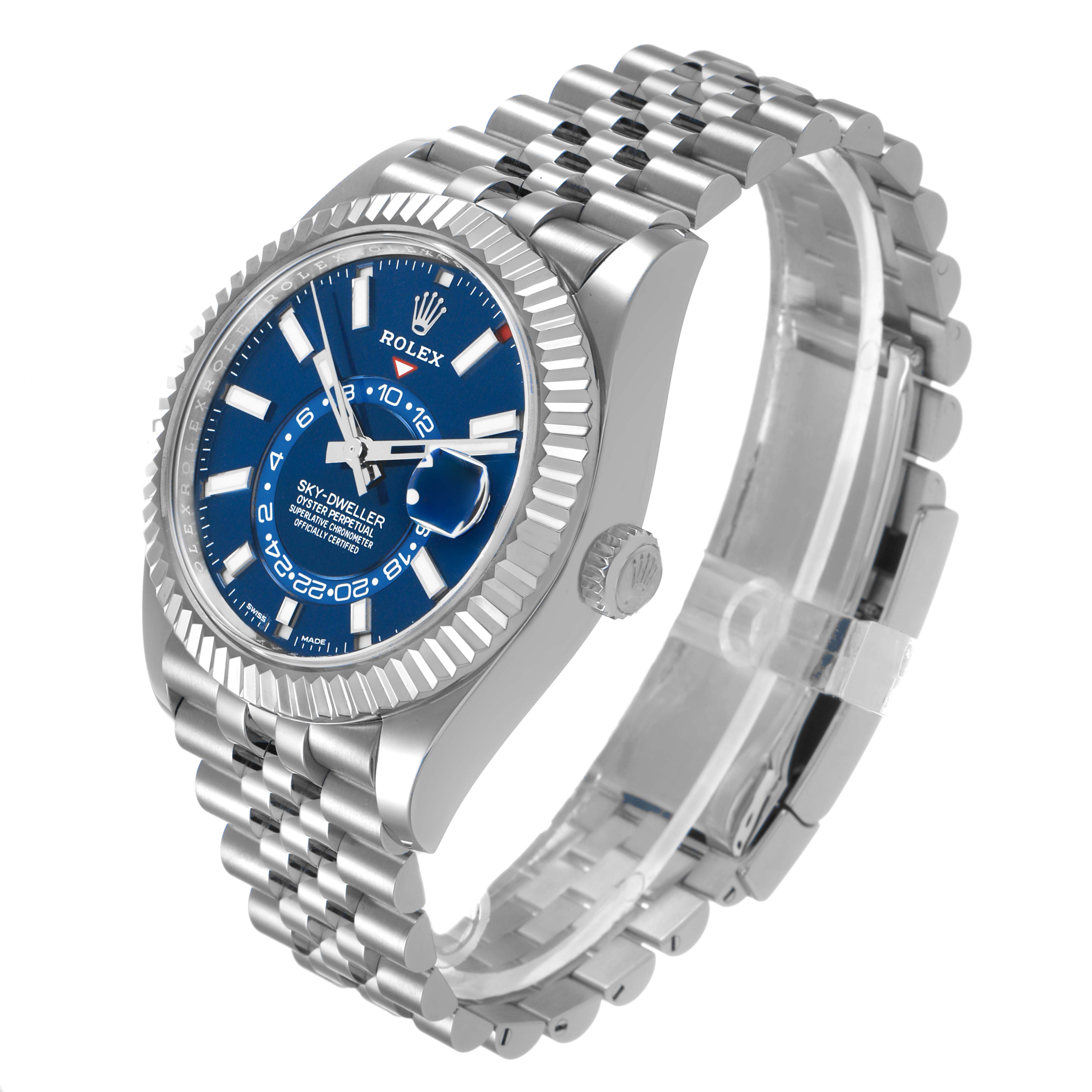 The Rolex Sky-Dweller 336934 Men's Stainless Steel Blue Dial watch is shown at a three-quarter angle, displaying its face, fluted bezel, and Jubilee bracelet.