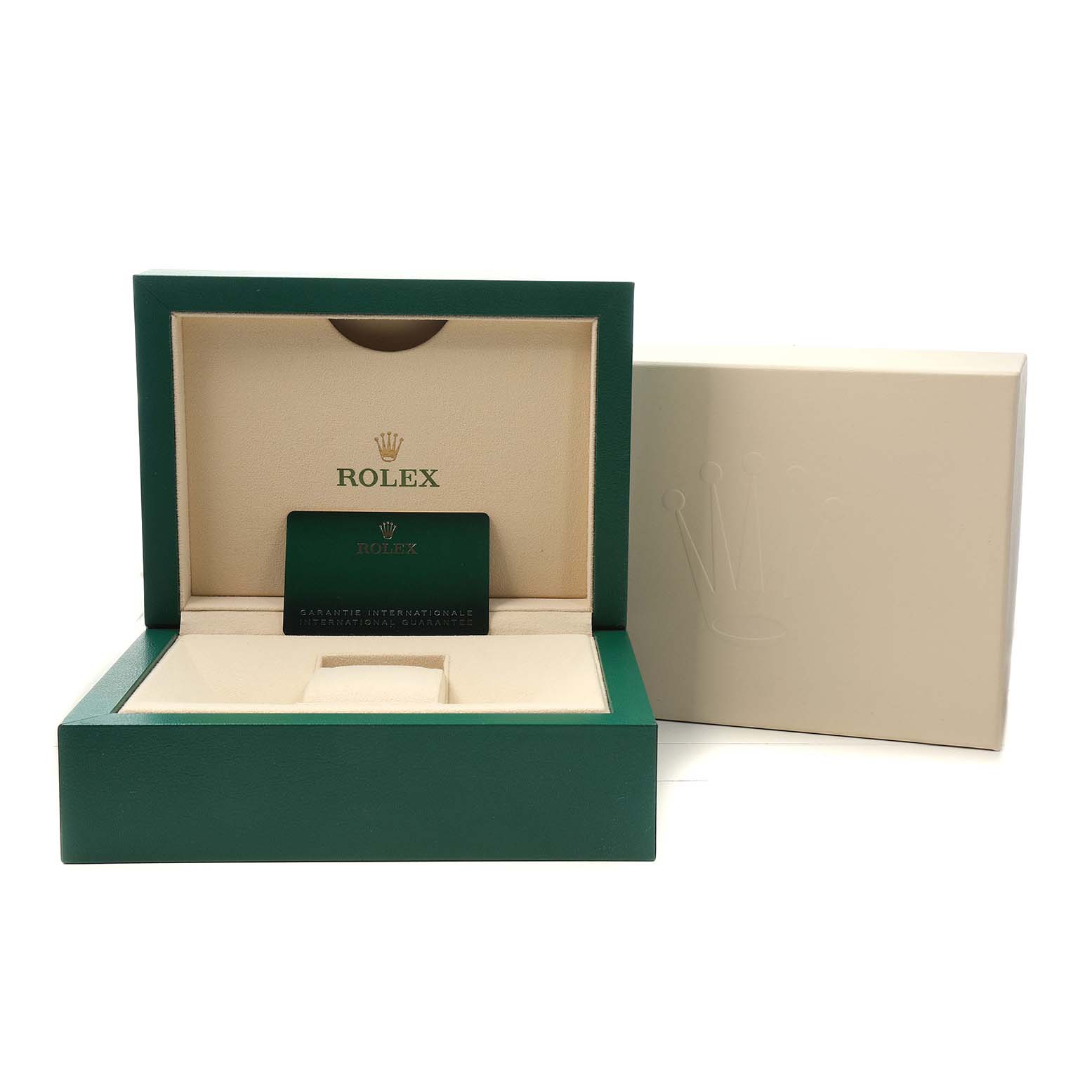 The image shows an open Rolex box for a Sky-Dweller model, displaying a card inside.