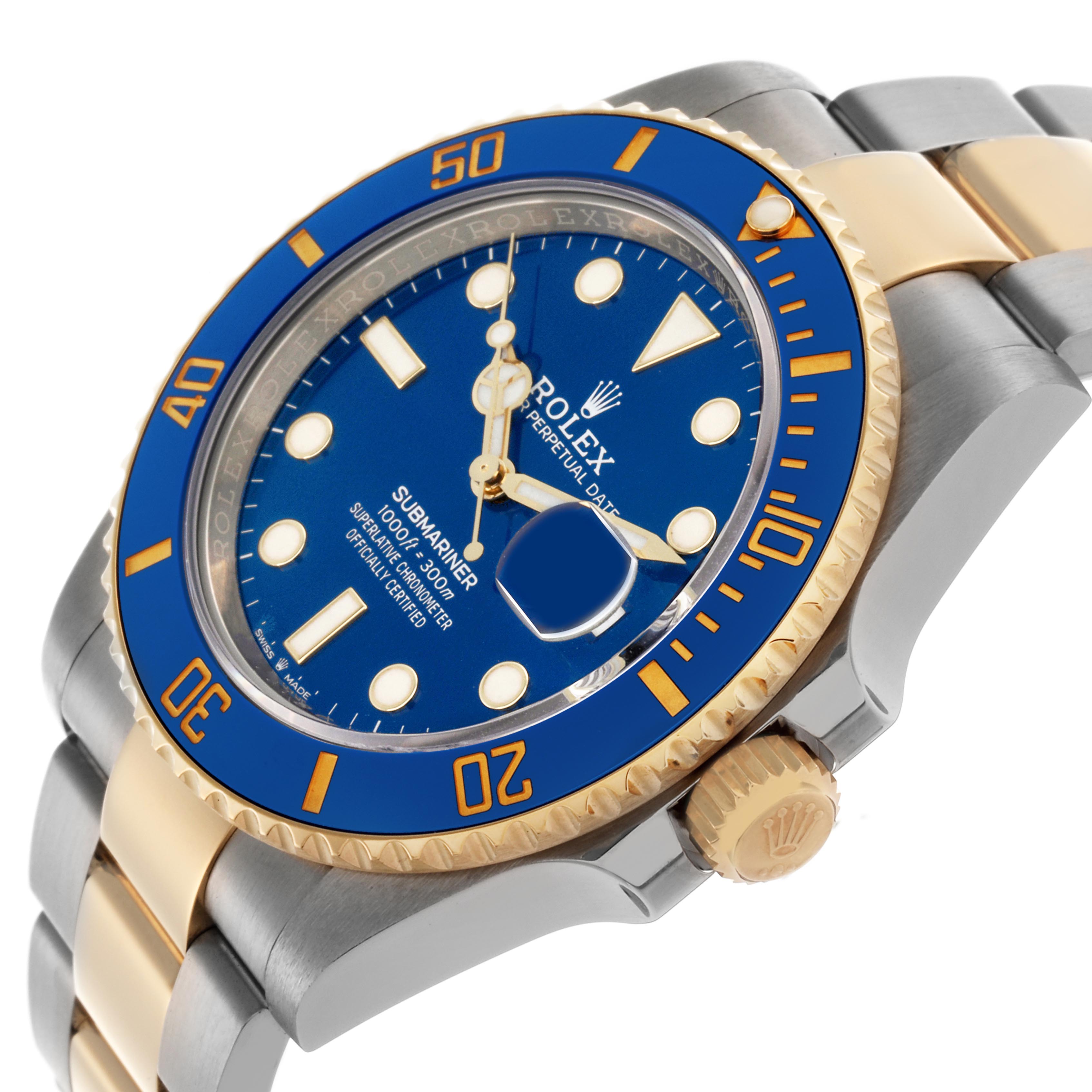The Rolex Submariner 126613 Men
s Steel and Gold (two tone) Blue Dial 126613 Men
s Steel and Gold (two tone) Blue Dial watch is shown at an angled top view, highlighting the blue bezel, dial, and gold accents on the bracelet.