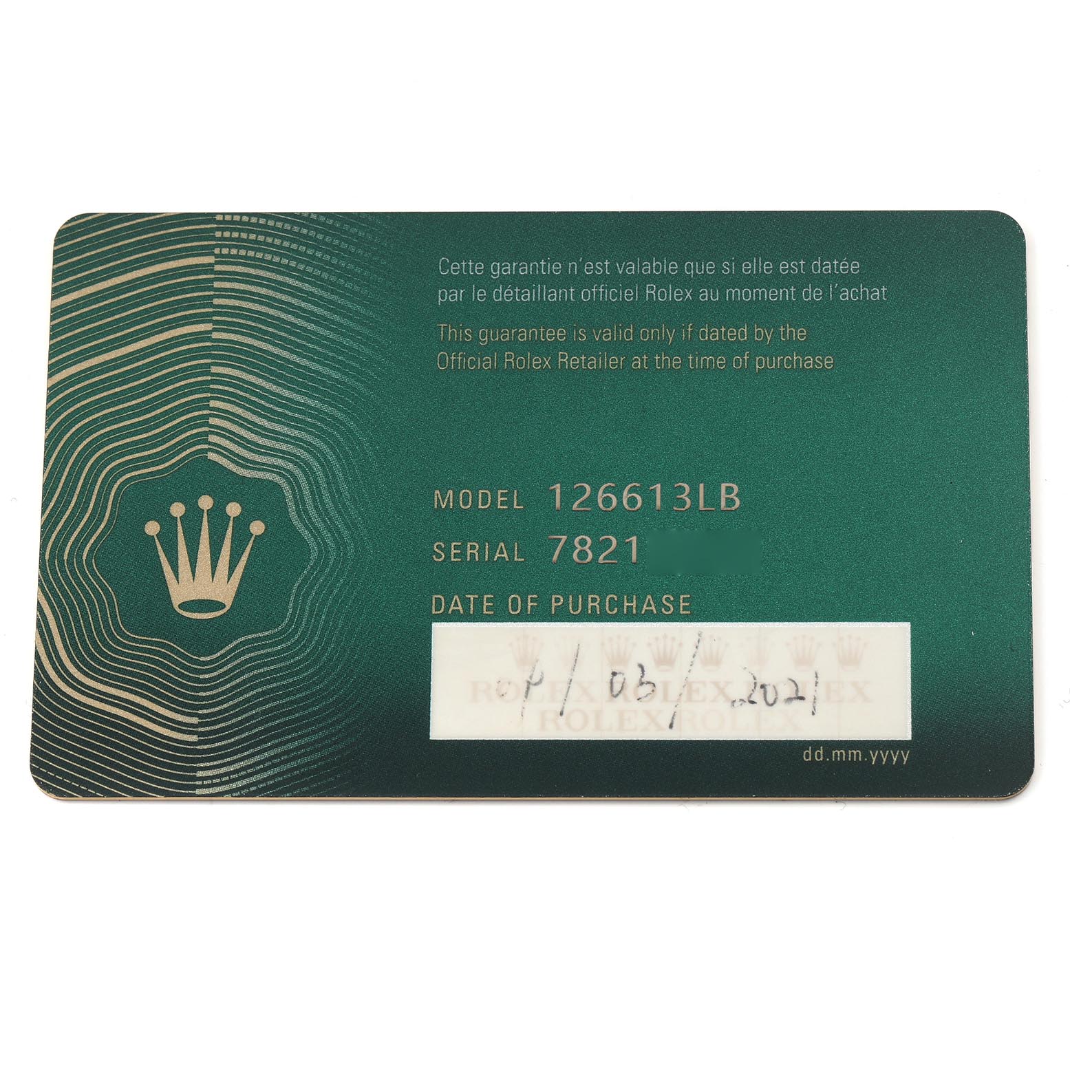 The image shows a warranty card for a Rolex Submariner 126613 Men
s Steel and Gold (two tone) Blue Dial 126613 Men
s Steel and Gold (two tone) Blue Dial model 126613LB, displaying model and serial numbers.