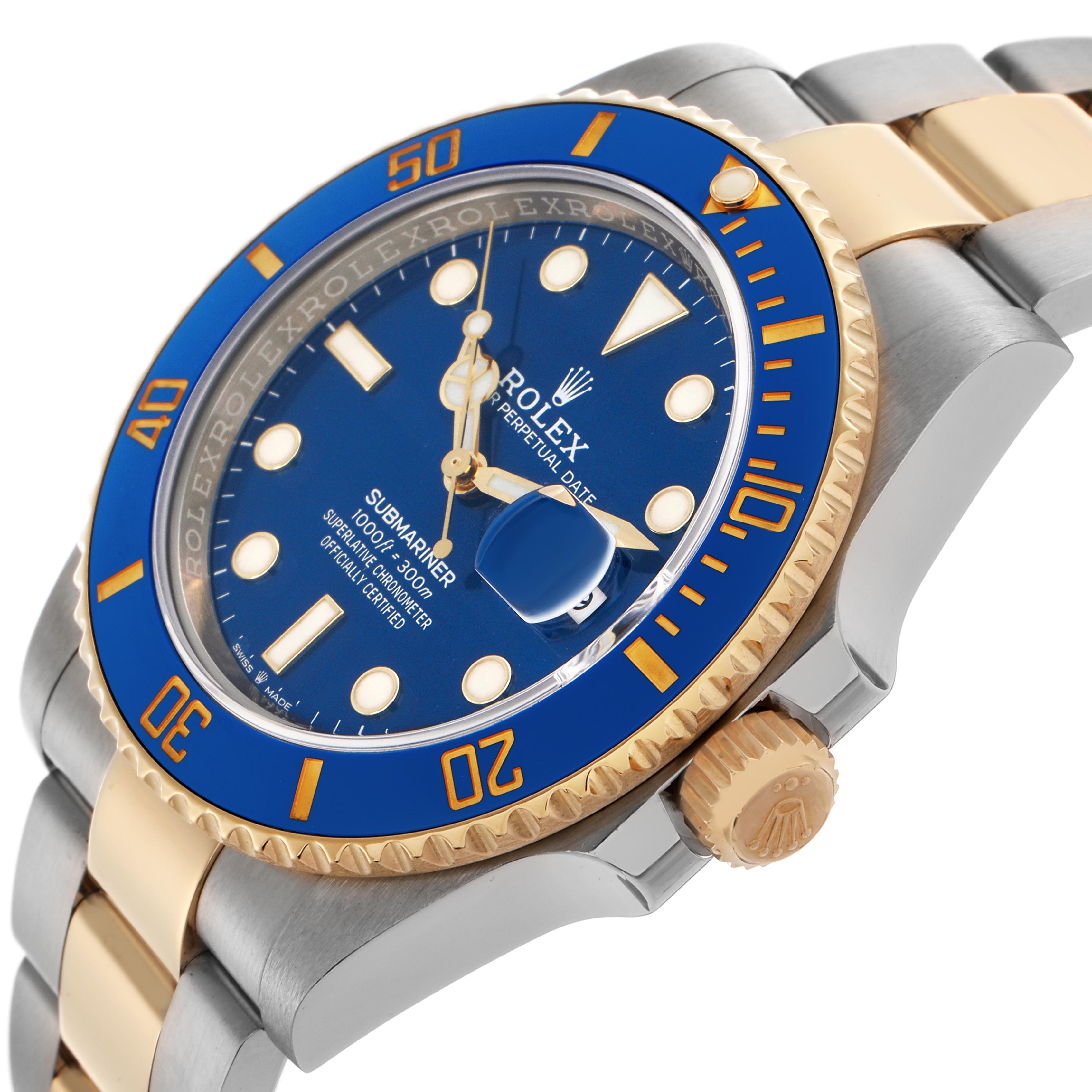 The Rolex Submariner 126613 Men
s Steel and Gold (two tone) Blue Dial 126613 Men
s Steel and Gold (two tone) Blue Dial watch is shown from a side angle, highlighting the bezel, crown, and part of the bracelet.