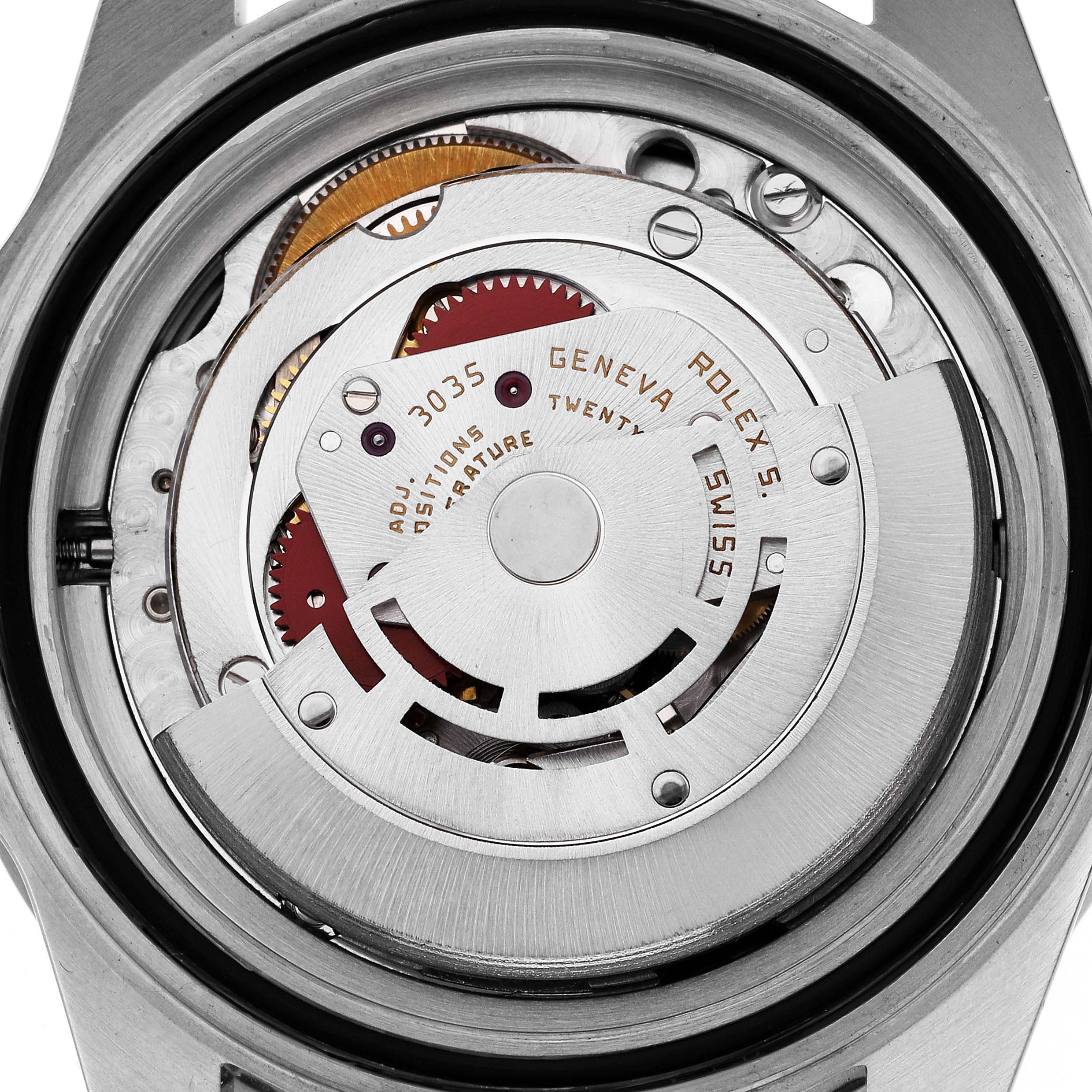The image shows the movement mechanism of a Rolex Submariner 168000 Men
s Stainless Steel Black Dial 168000 Men
s Stainless Steel Black Dial watch, viewed from the back.