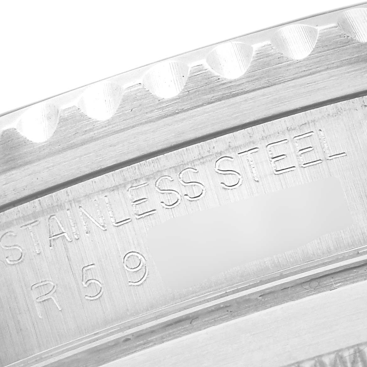 The image shows a close-up view of the edge and markings on the casing of a Rolex Submariner 168000 Men
s Stainless Steel Black Dial 168000 Men
s Stainless Steel Black Dial watch made from stainless steel.