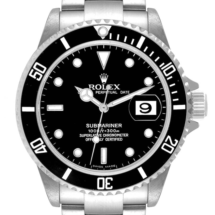 The Rolex Submariner watch is shown from a top-down angle, highlighting the dial, bezel, and bracelet.