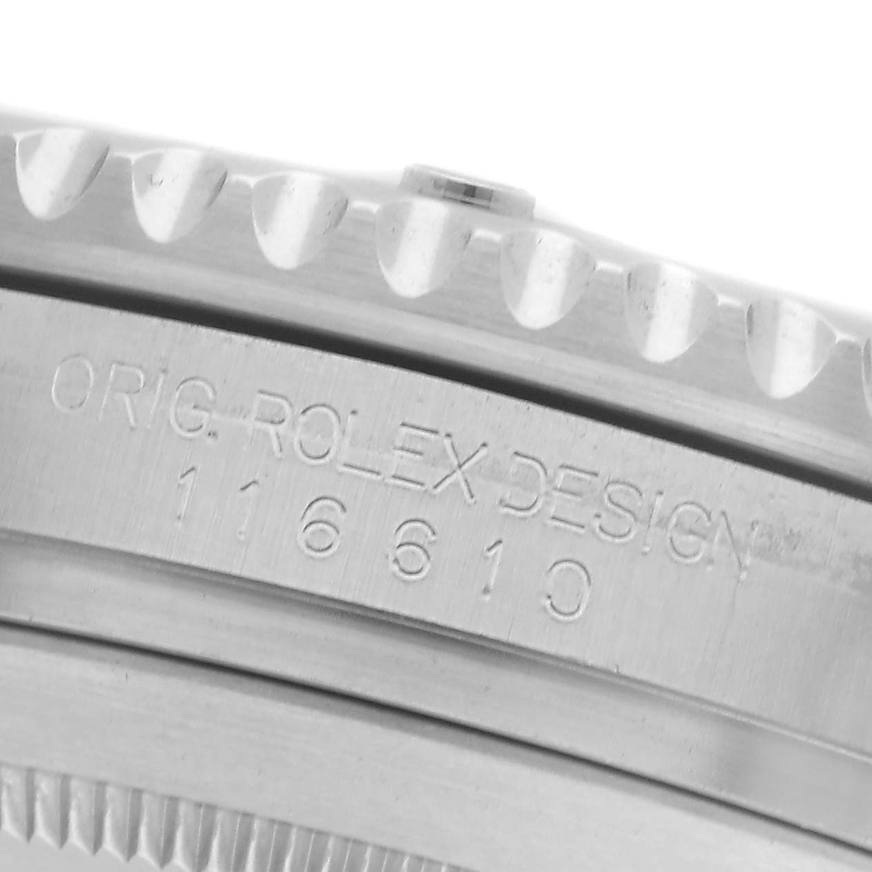 The image shows the side view of a Rolex Submariner 116610LV Men
s Stainless Steel Green Dial 116610LV Men
s Stainless Steel Green Dial, focusing on the engraved case with its model number.