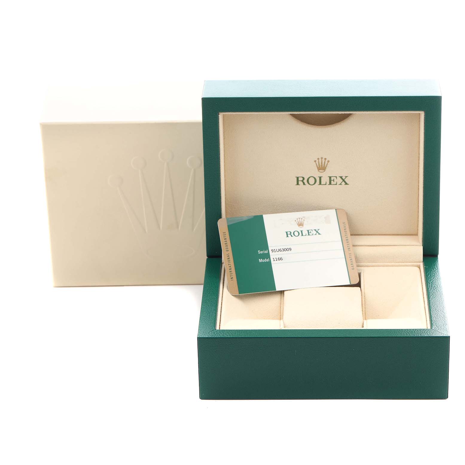 The image shows a Rolex Submariner 116610LV Men
s Stainless Steel Green Dial 116610LV Men
s Stainless Steel Green Dial watch box with its warranty card displayed inside.
