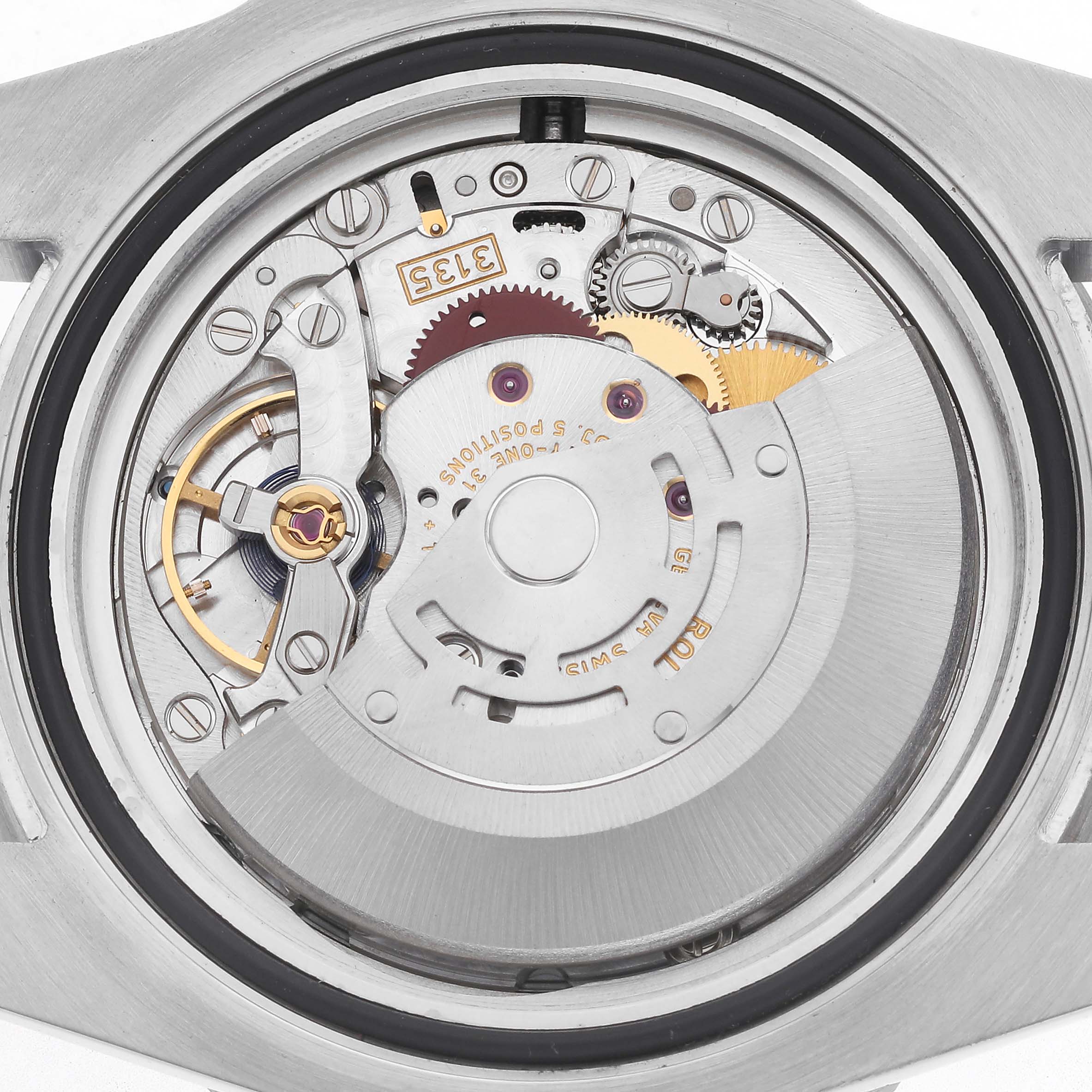 The image shows the movement mechanism of a Rolex Submariner 116610LV Men
s Stainless Steel Green Dial 116610LV Men
s Stainless Steel Green Dial watch viewed from the back without the case back.