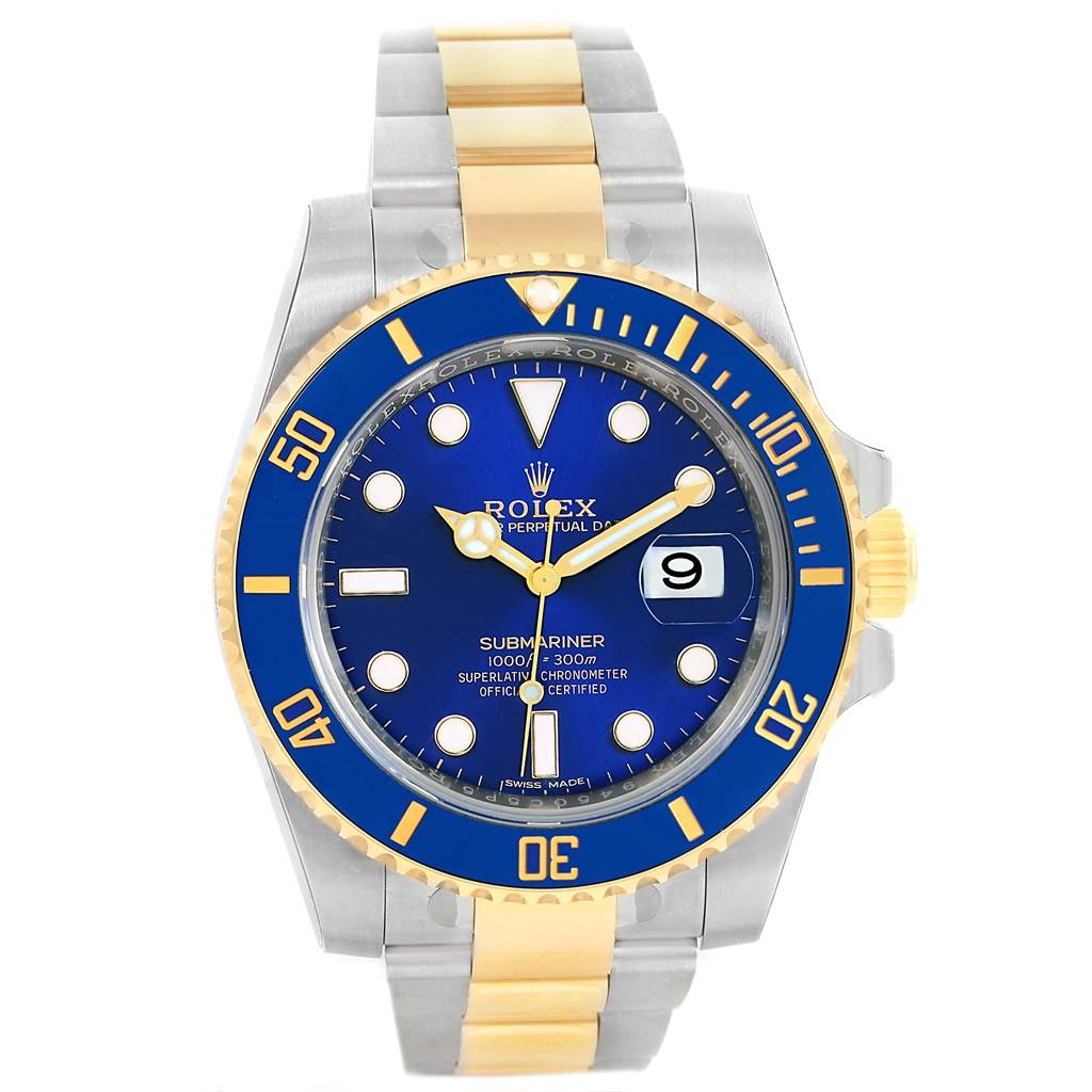 The image shows a front view of a Rolex Submariner 116613 Men
s Steel and Gold (two tone) Blue Dial 116613 Men
s Steel and Gold (two tone) Blue Dial watch with a blue dial, date display, and a two-tone metal bracelet.