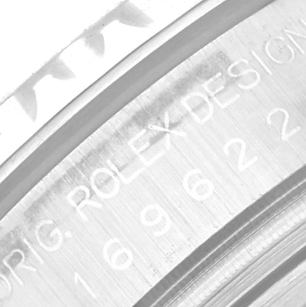 The image shows a close-up angle of the engraving on the case back of a Rolex Yacht-Master 169622 Women
s Stainless Steel Silver Dial 169622 Women
s Stainless Steel Silver Dial watch.