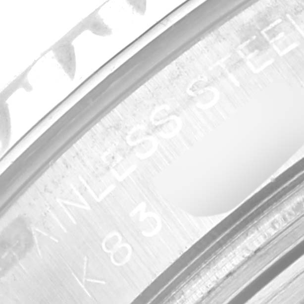 The image shows a close-up angle of the side bezel of a Rolex Yacht-Master 169622 Women
s Stainless Steel Silver Dial 169622 Women
s Stainless Steel Silver Dial watch, highlighting the engraving details.