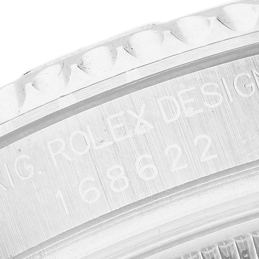The image shows a close-up of the edge and serial number of a Rolex Yacht-Master 168622 Men's Stainless Steel Silver Dial watch.