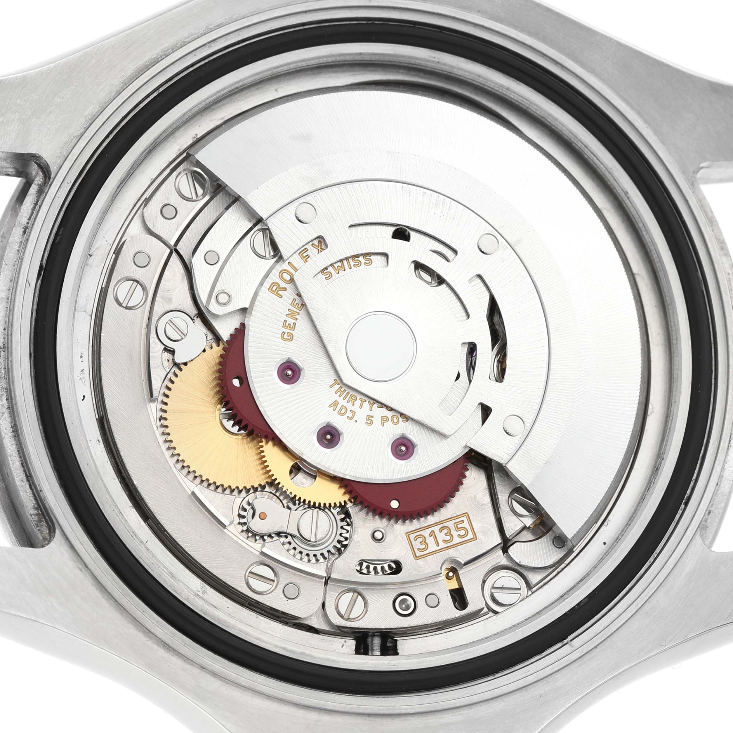 The image shows the movement of a Rolex Yacht-Master 116622 Men's Stainless Steel Silver Dial watch viewed from the back, highlighting its internal mechanisms.