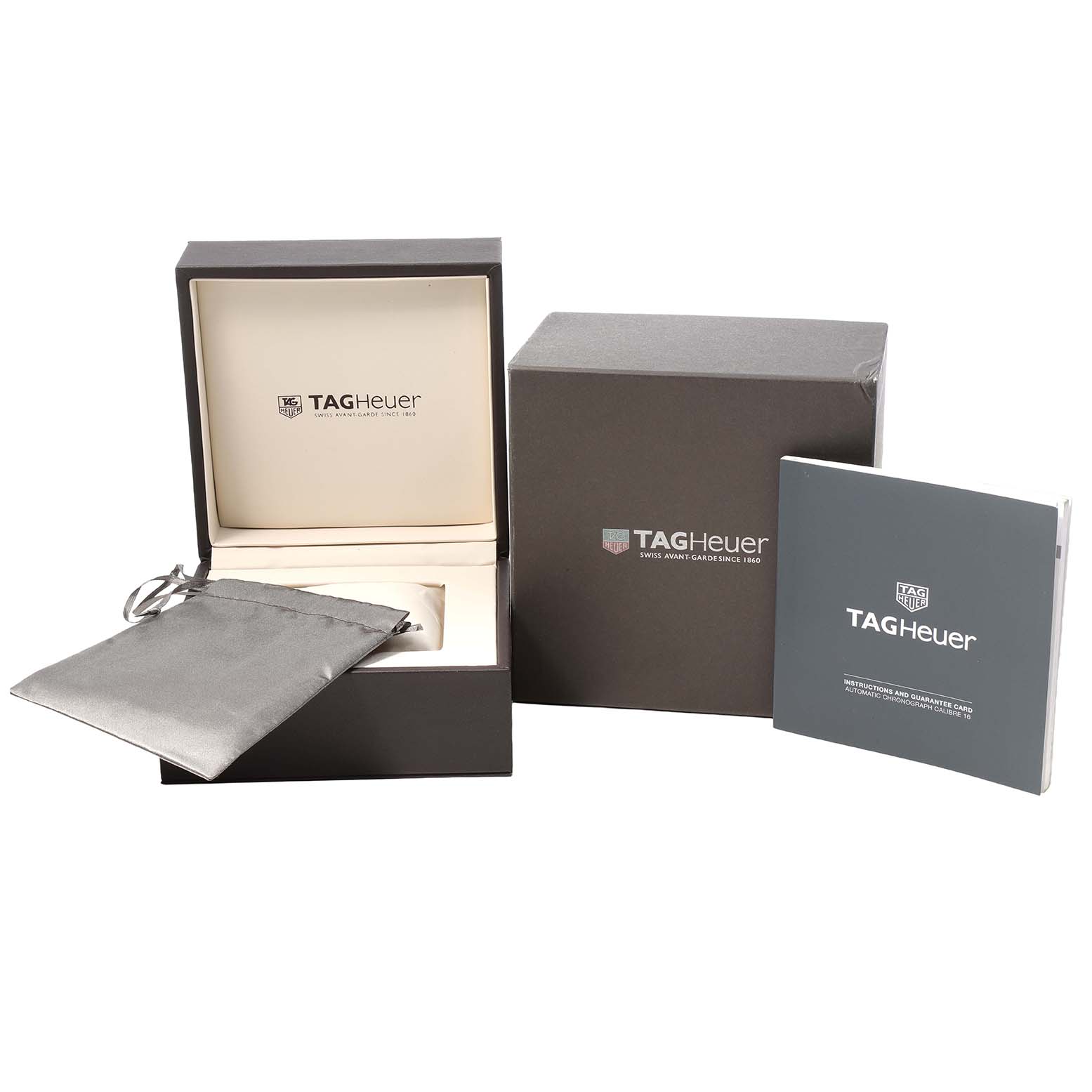 The image shows boxes, a pouch, and a booklet for the Tag Heuer Carrera CBK2112 Men's Stainless Steel Blue Dial watch.