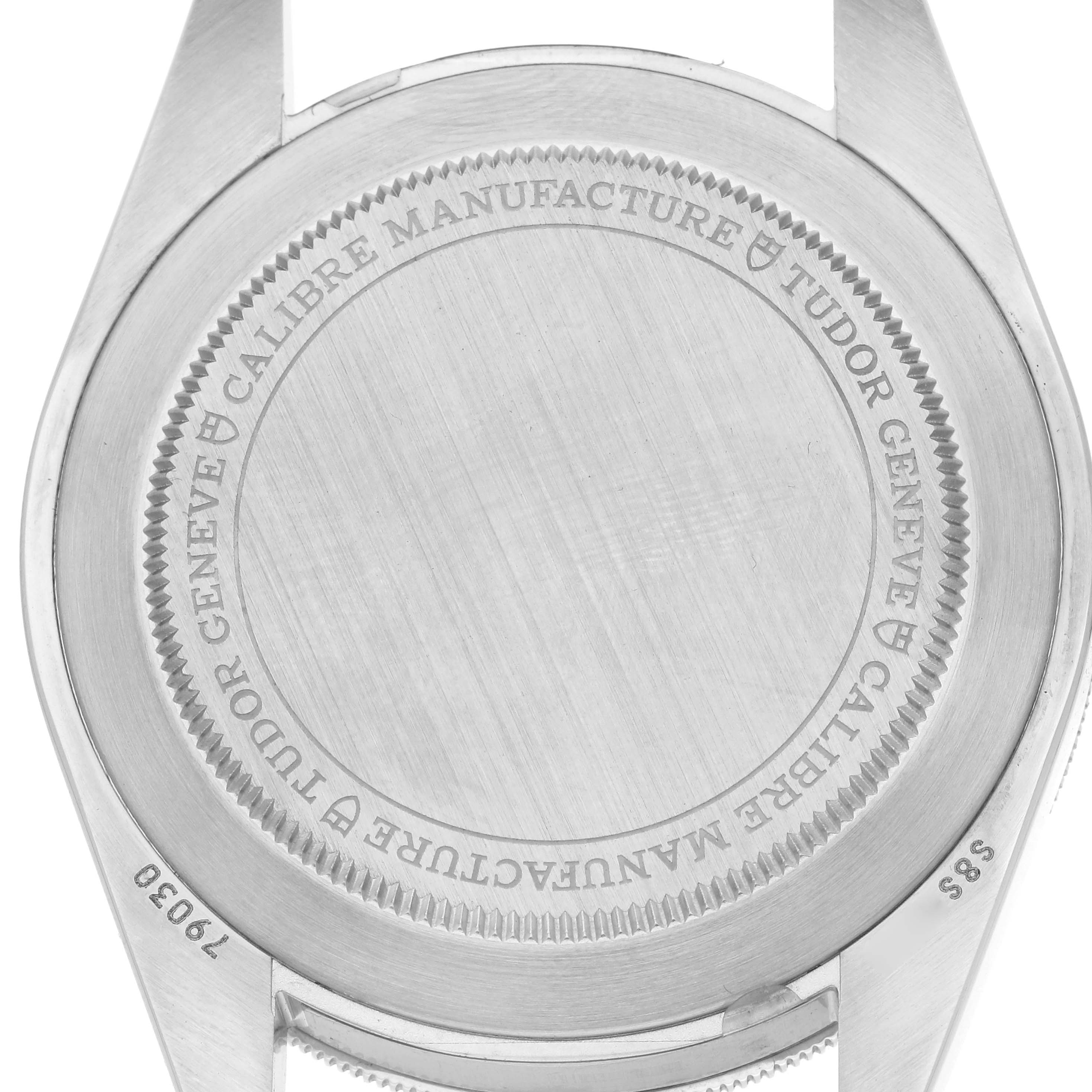 The image shows the back of a Tudor Heritage Black Bay M79030N-0001 Men
s Stainless Steel Black Dial M79030N-0001 Men
s Stainless Steel Black Dial watch, highlighting the engraved case back details.