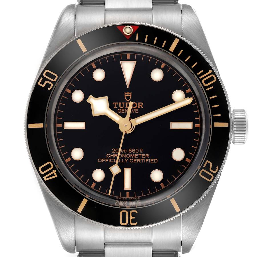 The Tudor Heritage Black Bay watch is shown from the front, highlighting the dial, bezel, and crown.