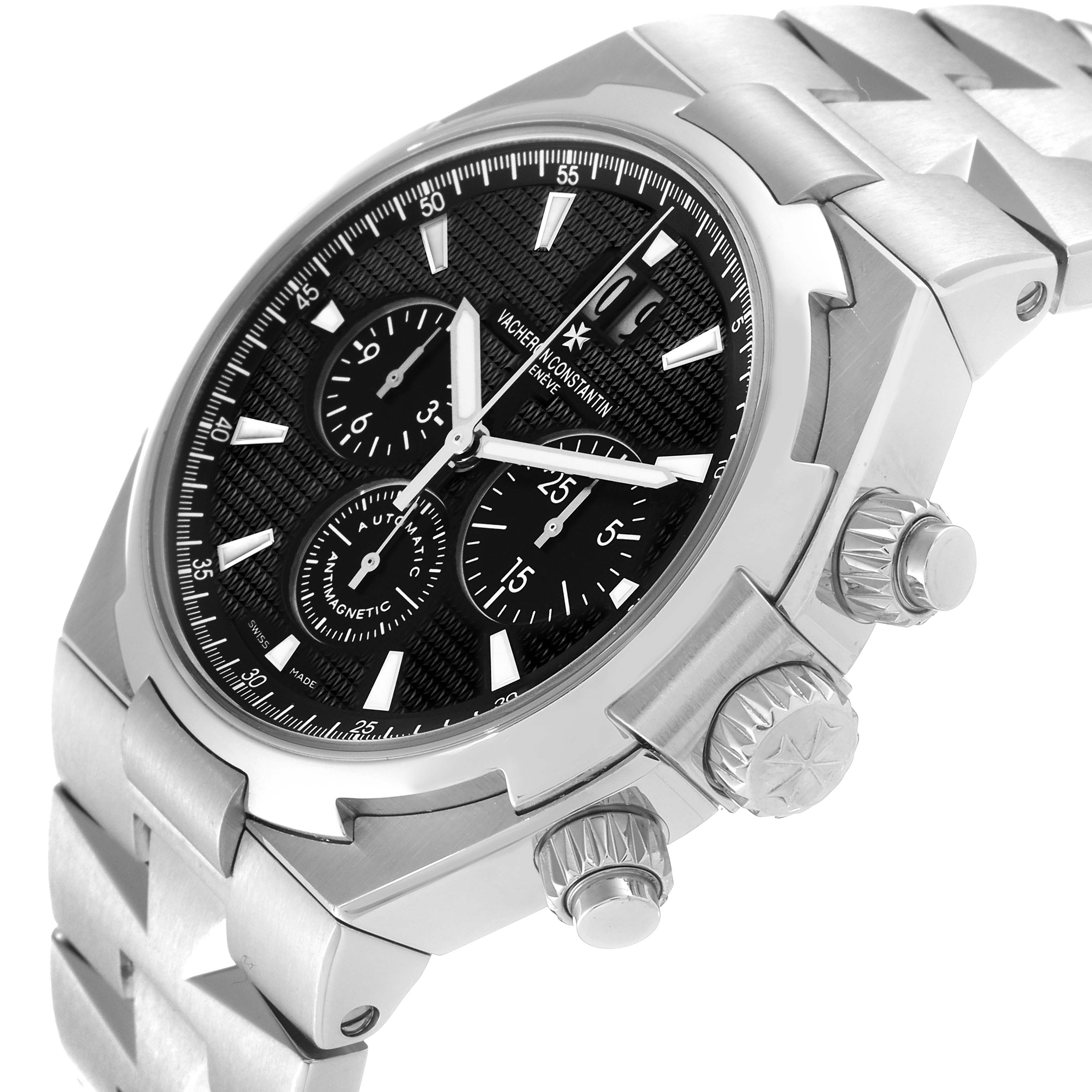 The image shows a close-up side angle of the Vacheron Constantin Overseas 49150/B01A-9097 Men's Stainless Steel Black Dial 49150/B01A-9097 Men's Stainless Steel Black Dial model watch, highlighting the dial, crown, and pushers.