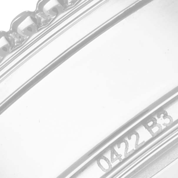 This close-up image highlights the side of the bezel and part of the case of the Breitling A17395 Women's Stainless Steel Mother of Pearl Dial A17395 Women's Stainless Steel Mother of Pearl Dial Navitimer Automatic 35 A17395 watch.