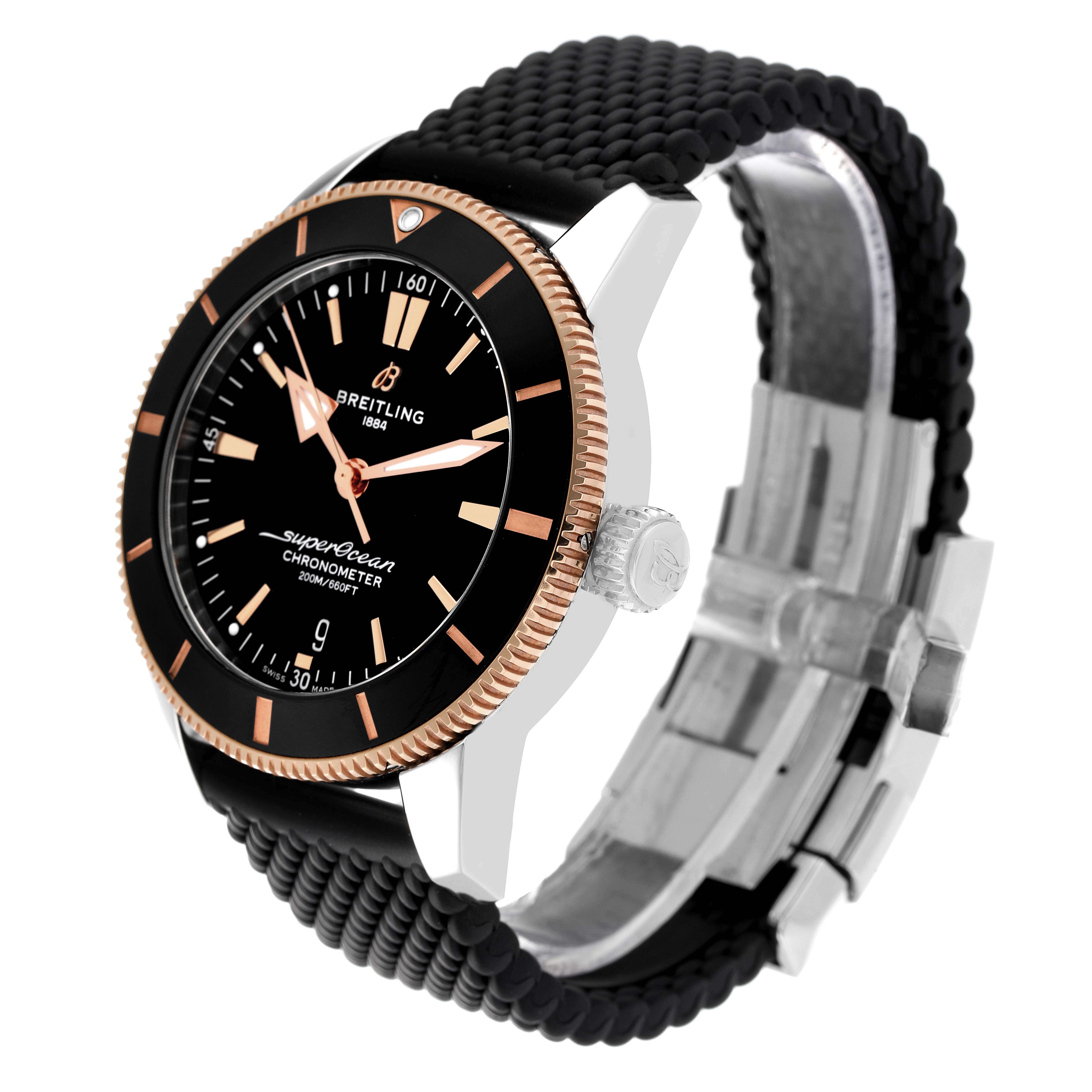 The image shows a Breitling Superocean UB2030121B1A1 Men's Steel and Gold (two tone) Black Dial UB2030121B1A1 Men's Steel and Gold (two tone) Black Dial watch from a 3/4 angle revealing the dial, bezel, crown, and part of the band and clasp.