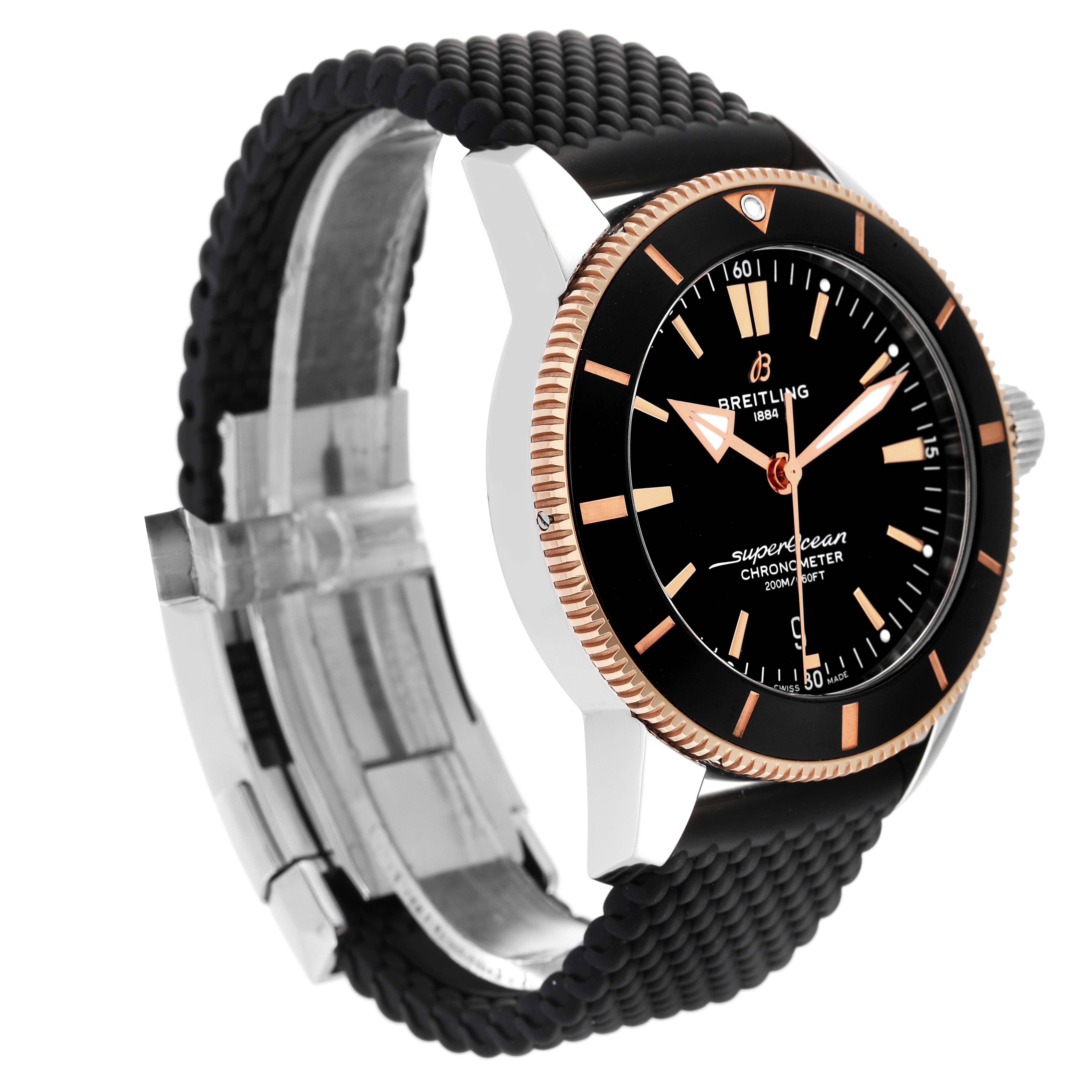 The Breitling Superocean UB2030121B1A1 Men's Steel and Gold (two tone) Black Dial UB2030121B1A1 Men's Steel and Gold (two tone) Black Dial watch is shown at an angle displaying its face, bezel, crown, and part of the band.