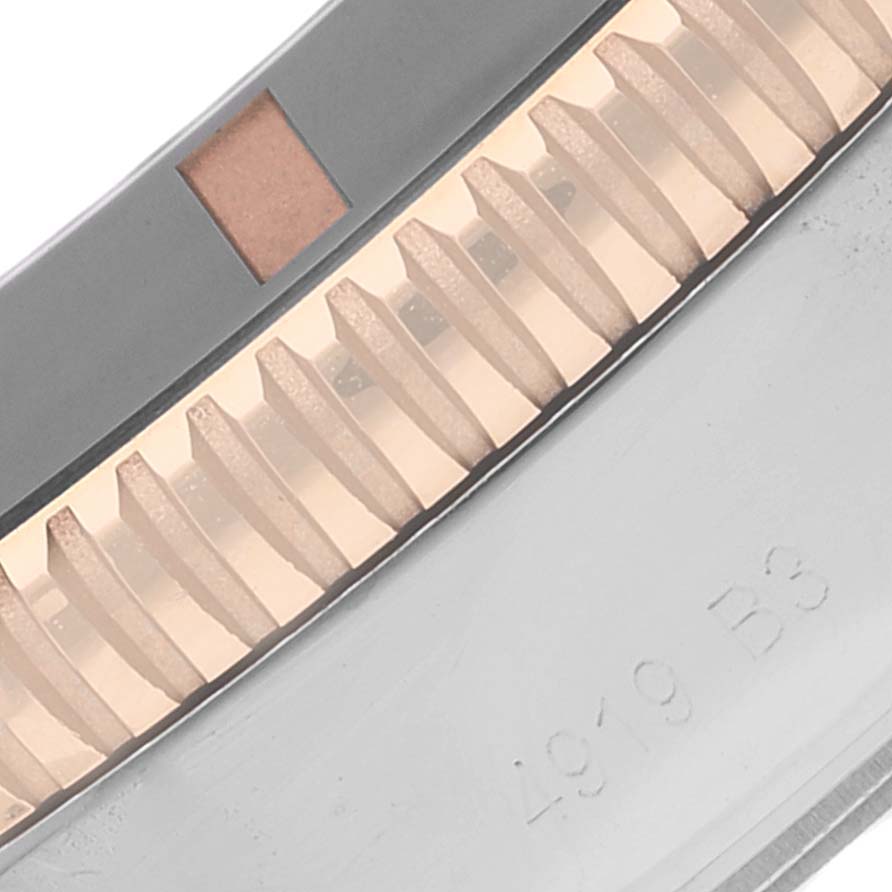 This close-up image shows the bezel and part of the case of the Breitling Superocean UB2030121B1A1 Men's Steel and Gold (two tone) Black Dial UB2030121B1A1 Men's Steel and Gold (two tone) Black Dial watch.