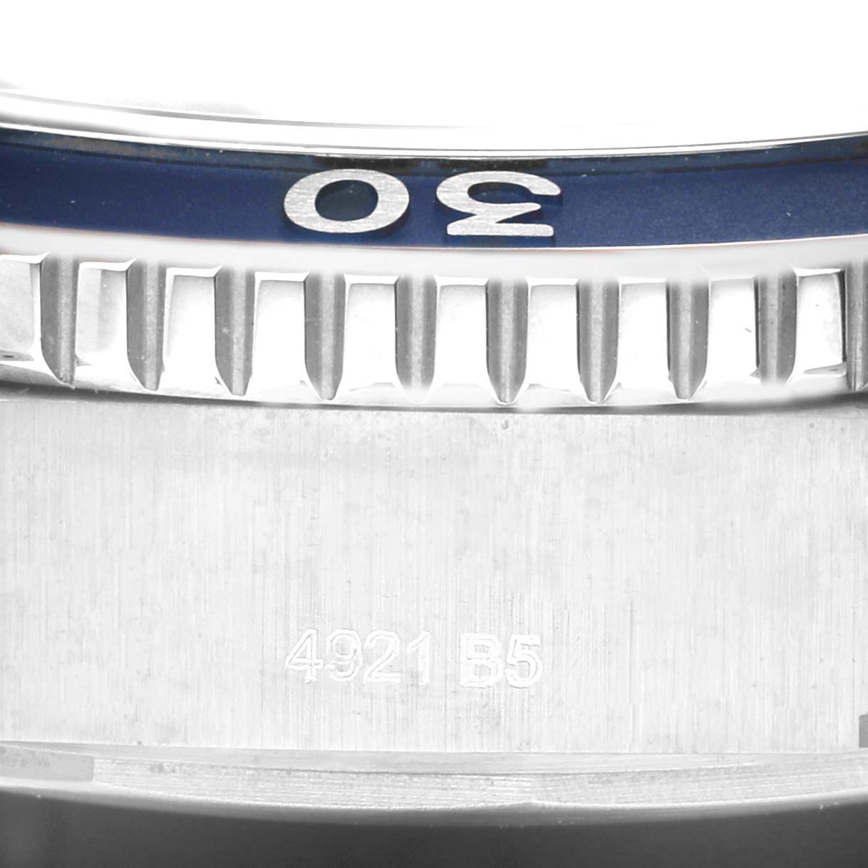 The image shows a close-up of the bezel and case of a Breitling Superocean A17367D81C1A1 Men's Stainless Steel Blue Dial A17367D81C1A1 Men's Stainless Steel Blue Dial watch with partial numerals and engraved serial number.
