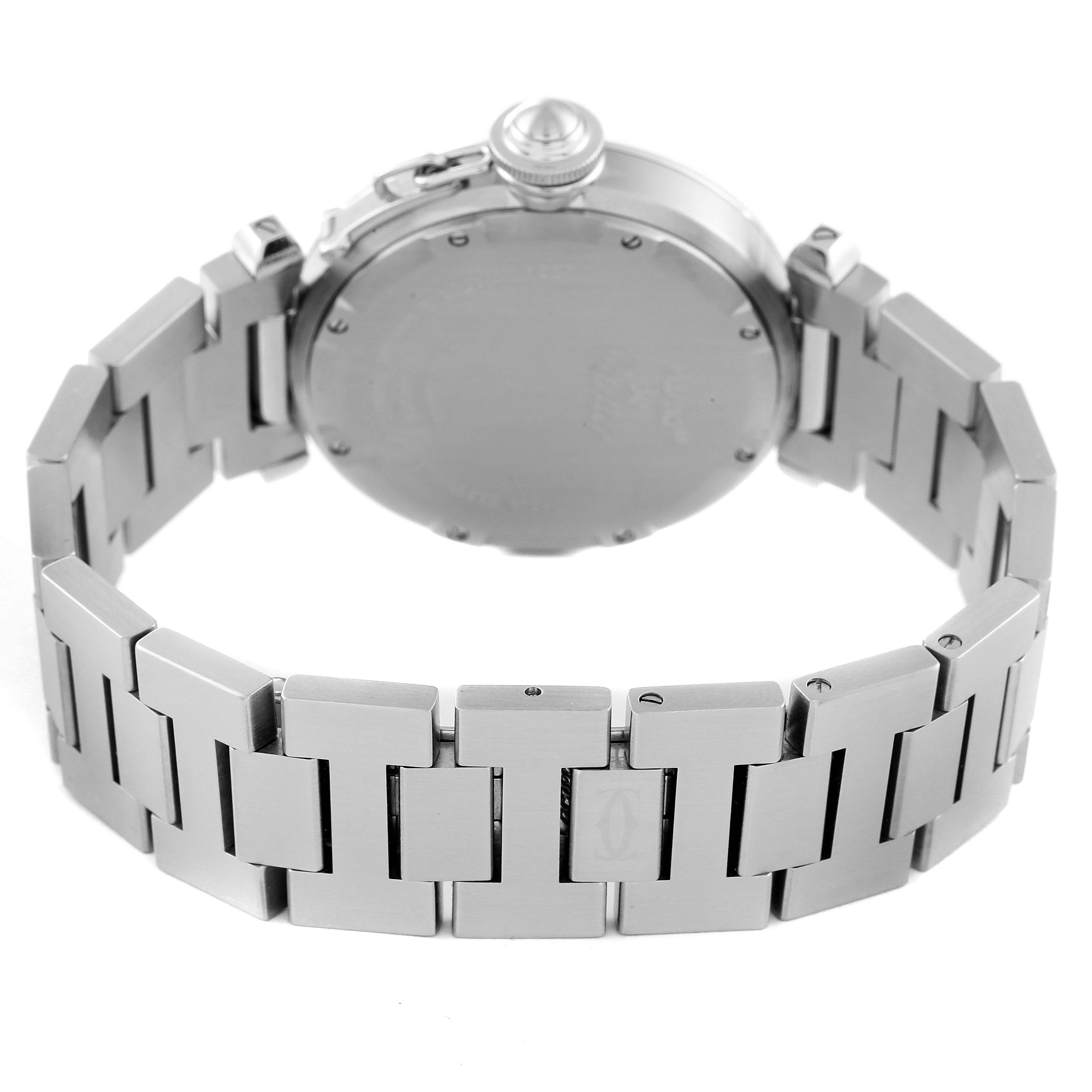 The image shows the back view of a Pasha model Cartier watch, focusing on the bracelet and case back.