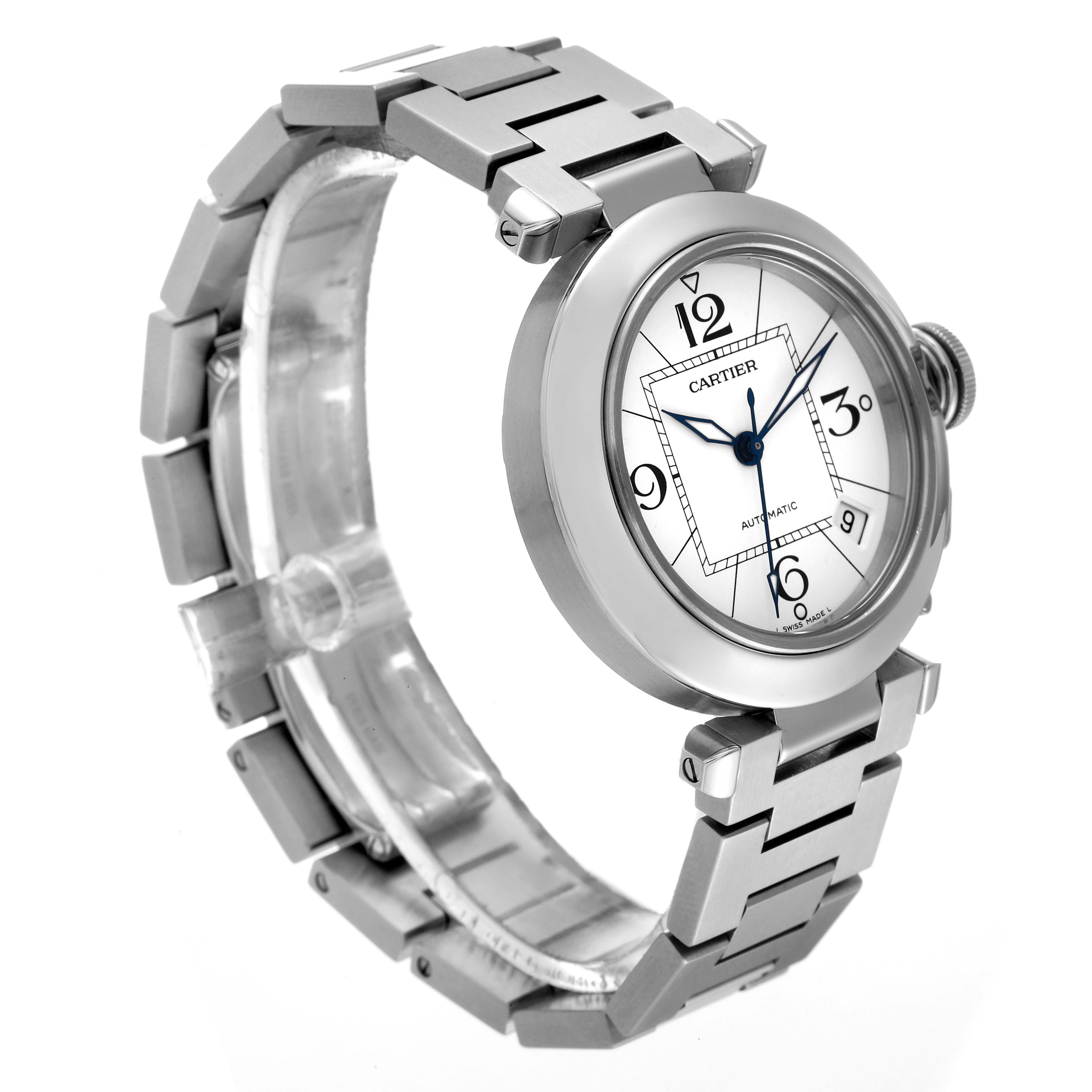 The watch shown is a Cartier Pasha W31074M7 Men's Stainless Steel White Dial W31074M7 Men's Stainless Steel White Dial, angled slightly to the right, highlighting its face, bezel, and part of its metal bracelet.