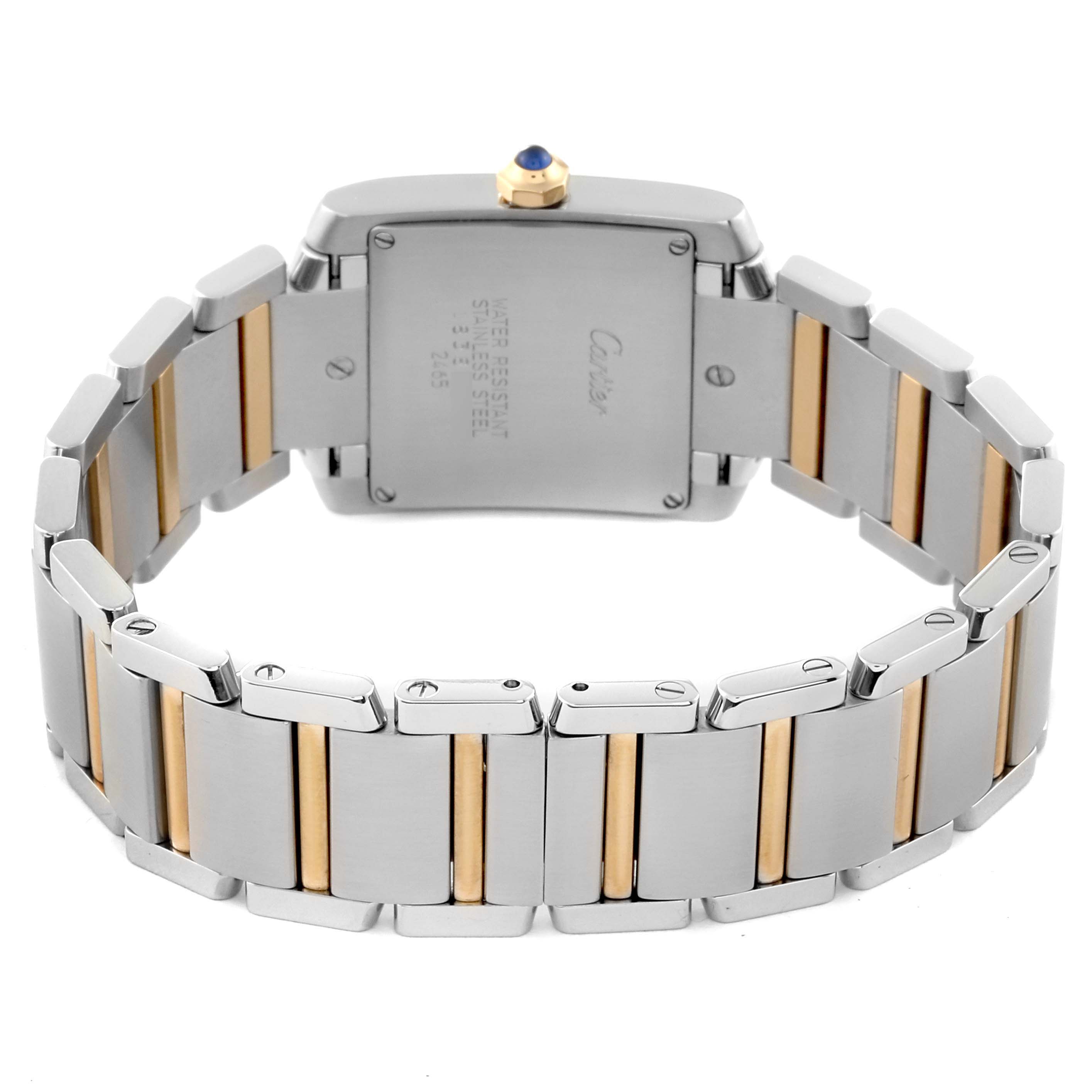 The image shows the back of the Cartier Tank Francaise W51012Q4 Women's Steel and Gold (two tone) Silver Dial W51012Q4 Women's Steel and Gold (two tone) Silver Dial watch, highlighting its two-tone metal bracelet and rear case.