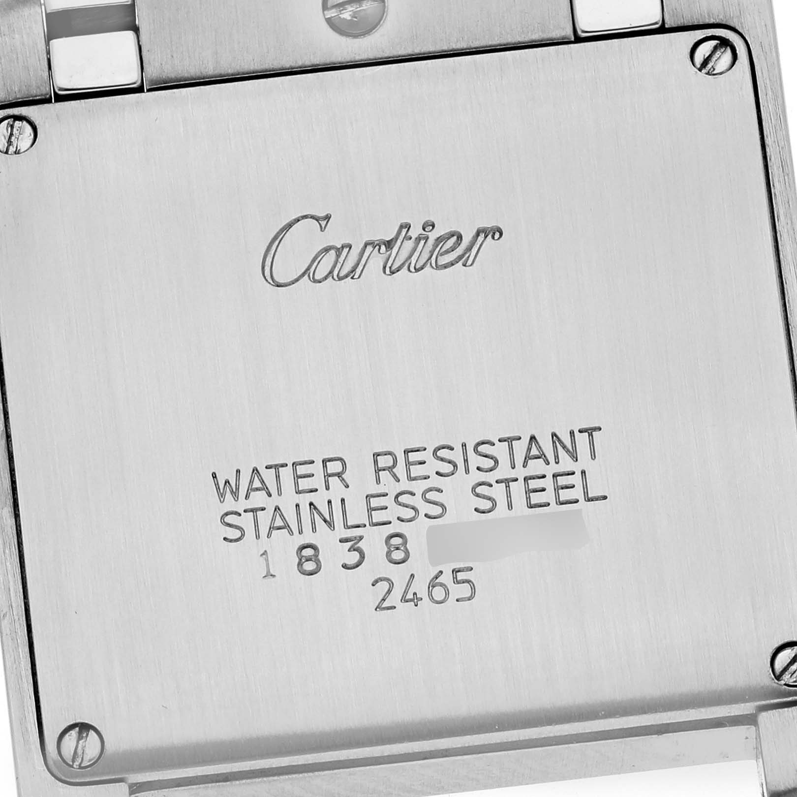 This image shows the back case of a Cartier Tank Française watch, highlighting the brand name and material details.