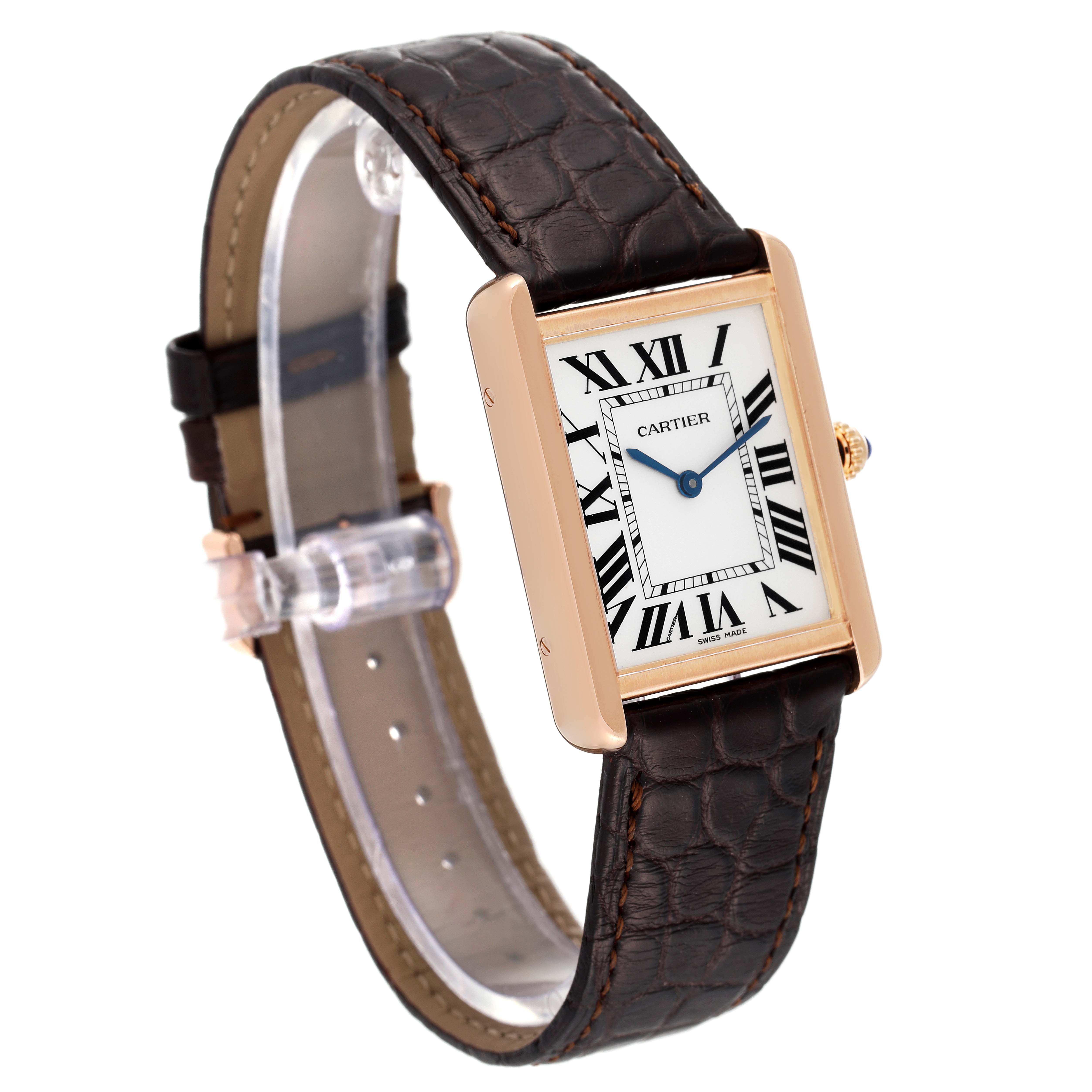 This Cartier Tank Solo W5200025 Men
s Rose Gold Silver Dial W5200025 Men
s Rose Gold Silver Dial watch is shown at an angle displaying its rectangular face, Roman numeral dial, crown, and leather strap.