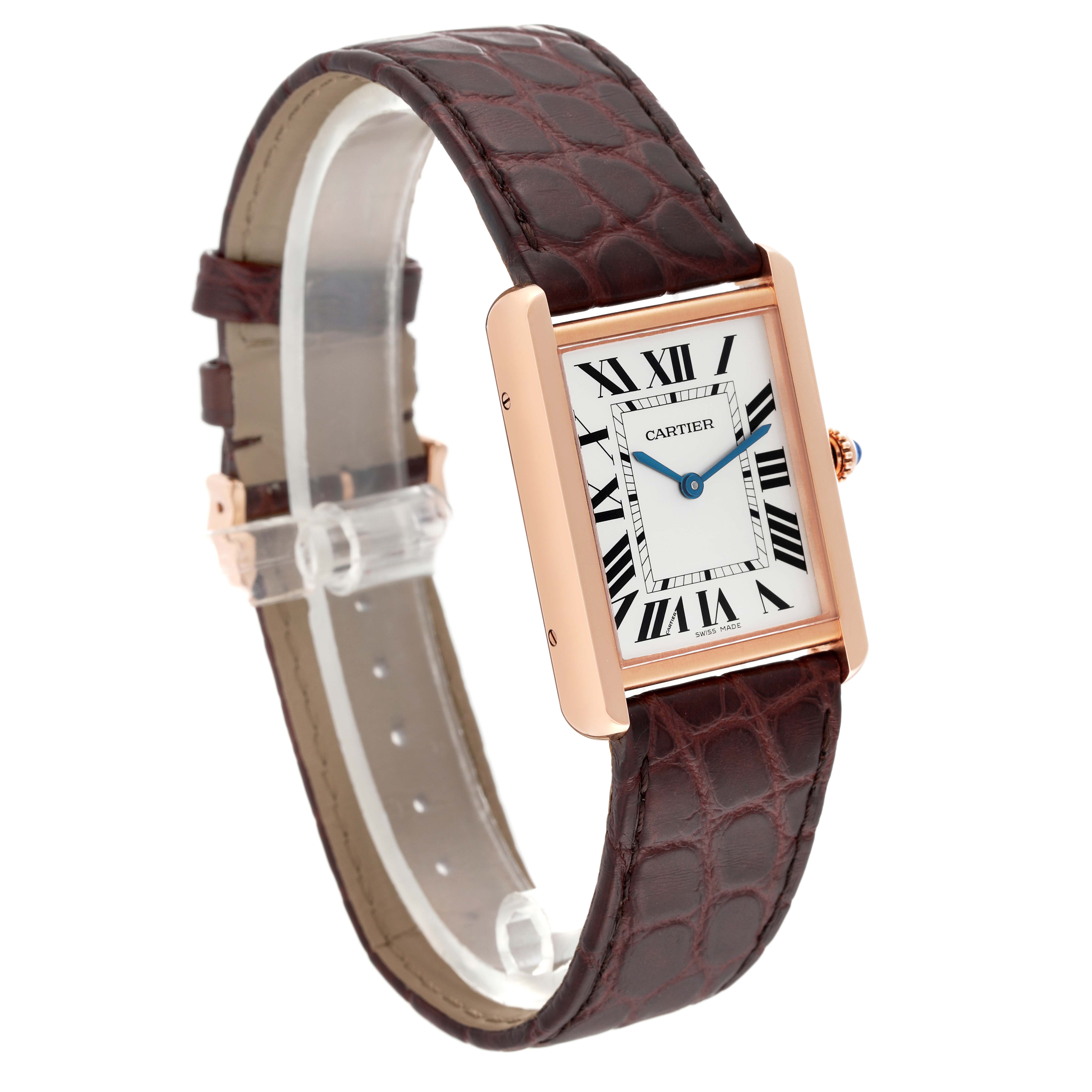 The Tank Solo model by Cartier is shown at an angle displaying its rectangular face, Roman numeral dial, and brown leather strap.