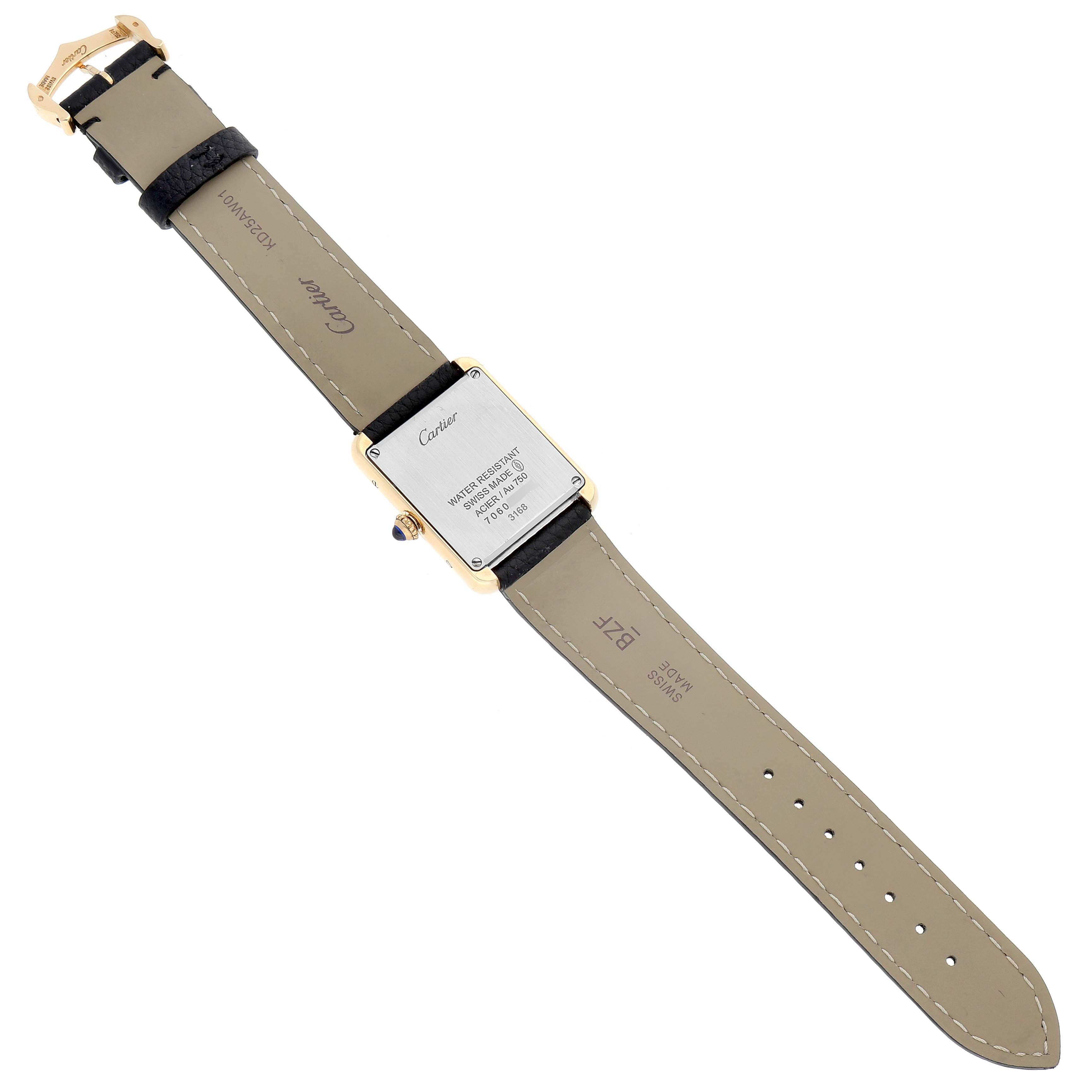 The image shows the backside of a Cartier Tank Solo W5200002 Women's Steel and Gold (two tone) Silver Dial W5200002 Women's Steel and Gold (two tone) Silver Dial watch, highlighting the strap and the case back.