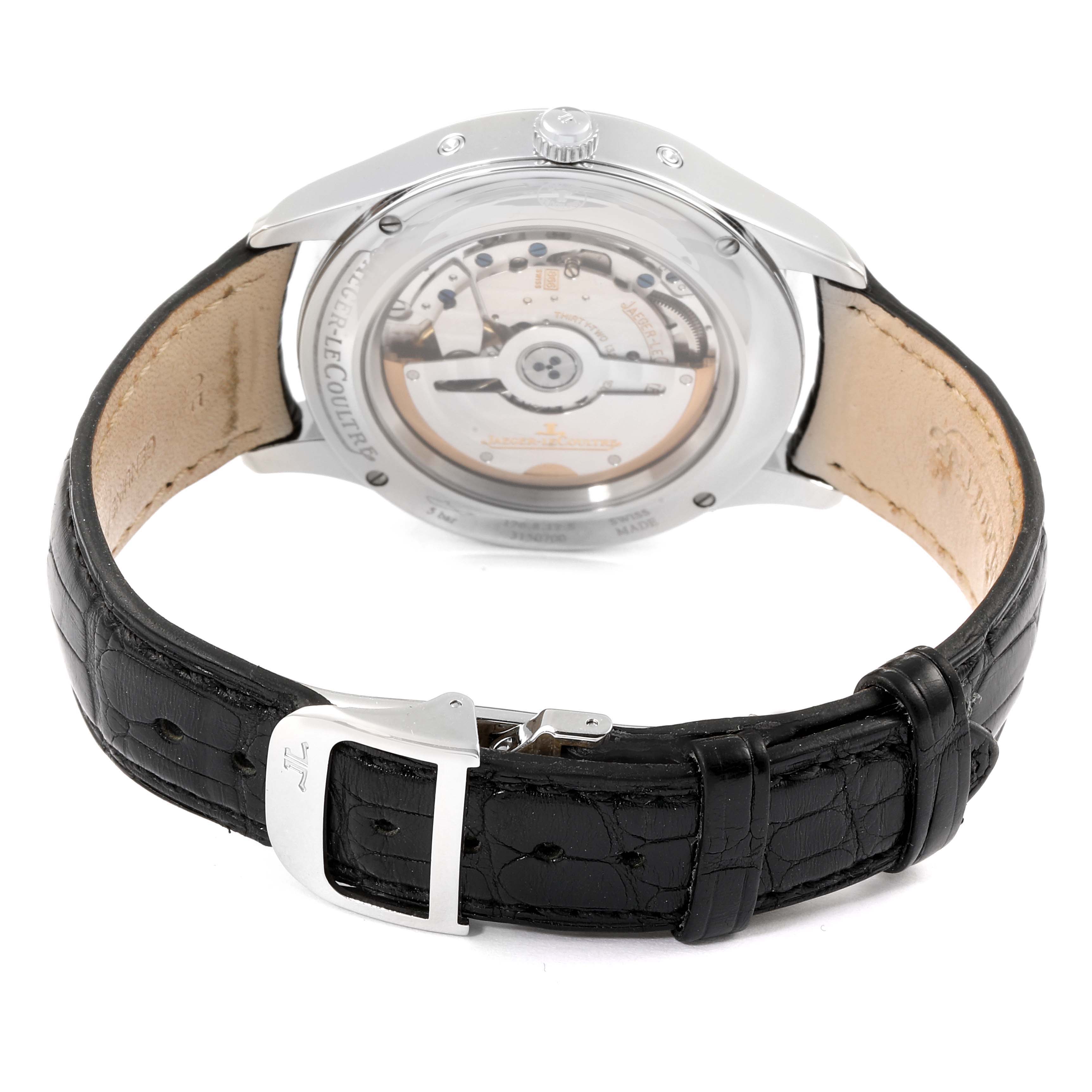 The image shows the back view of the Jaeger LeCoultre Master 140.8.98.S Men's Stainless Steel Silver Dial 140.8.98.S Men's Stainless Steel Silver Dial model watch, highlighting the leather strap and transparent case back that reveals the movement.