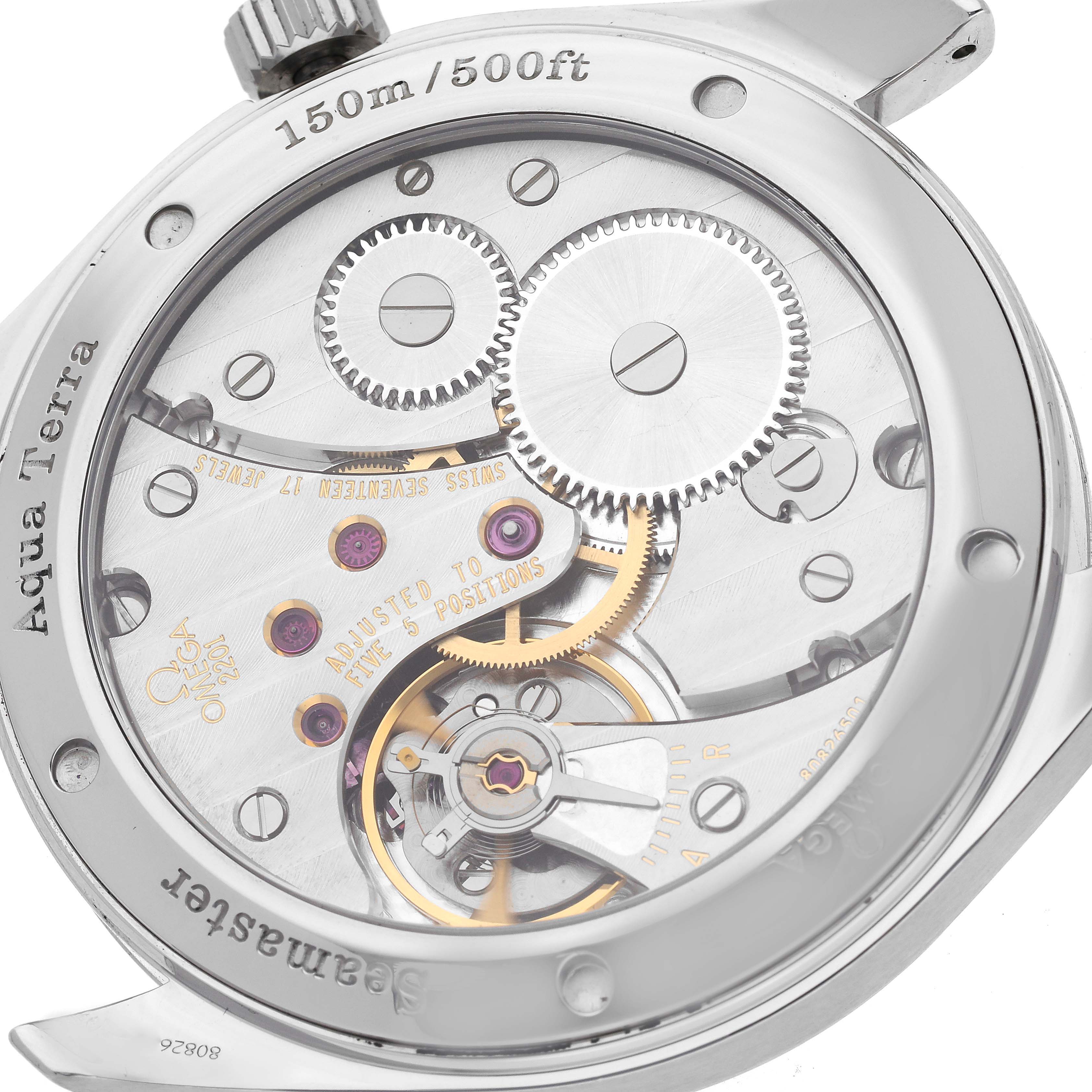 This image shows the back of an Omega Aqua Terra 2806.52.37 Men's Stainless Steel Black Dial 2806.52.37 Men's Stainless Steel Black Dial watch, highlighting its internal mechanical components.