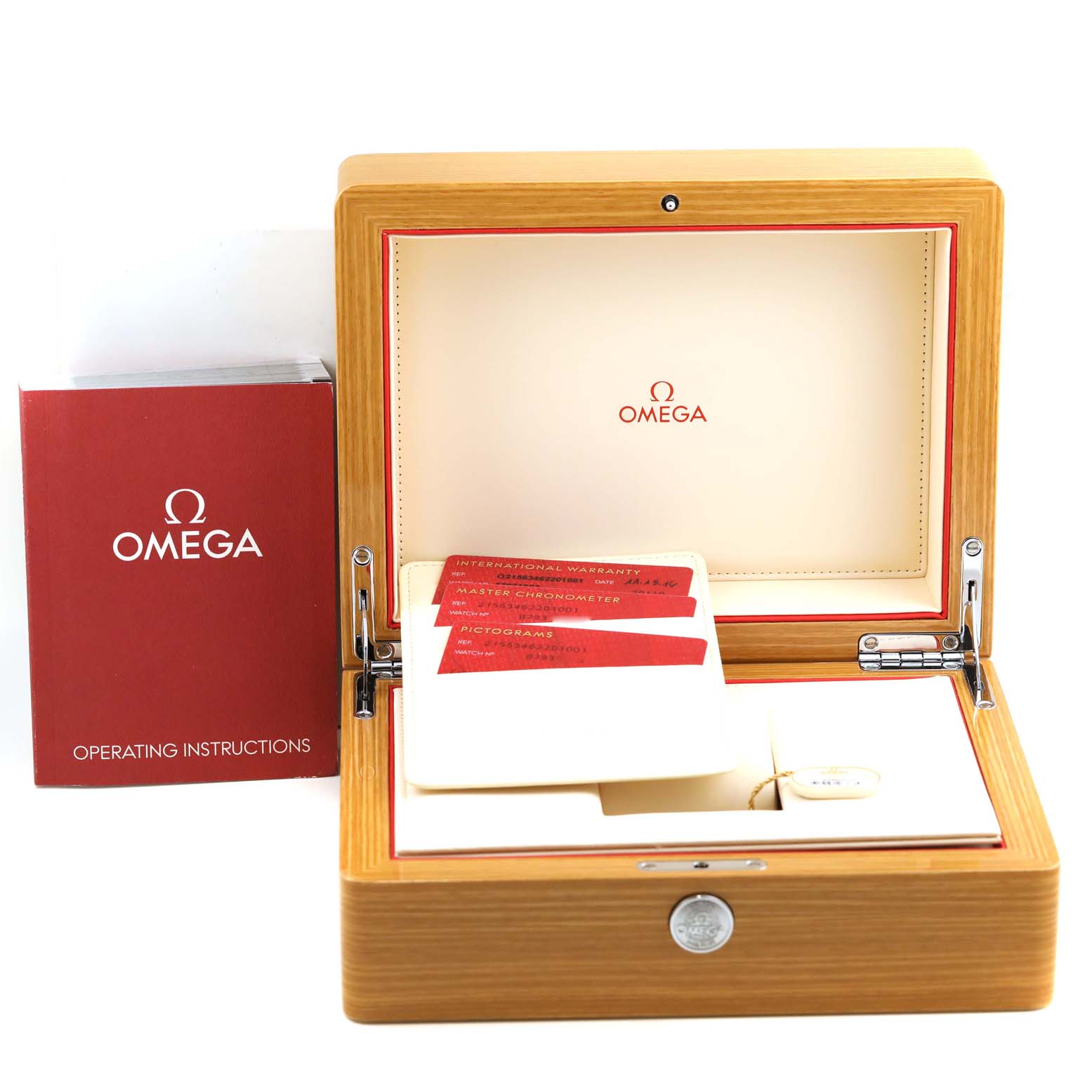 The image shows an Omega Planet Ocean 215.63.46.22.01.001 Men's Ceramic Black Dial 215.63.46.22.01.001 Men's Ceramic Black Dial watch box, operating instructions, warranty cards, and accessories from a frontal angle.