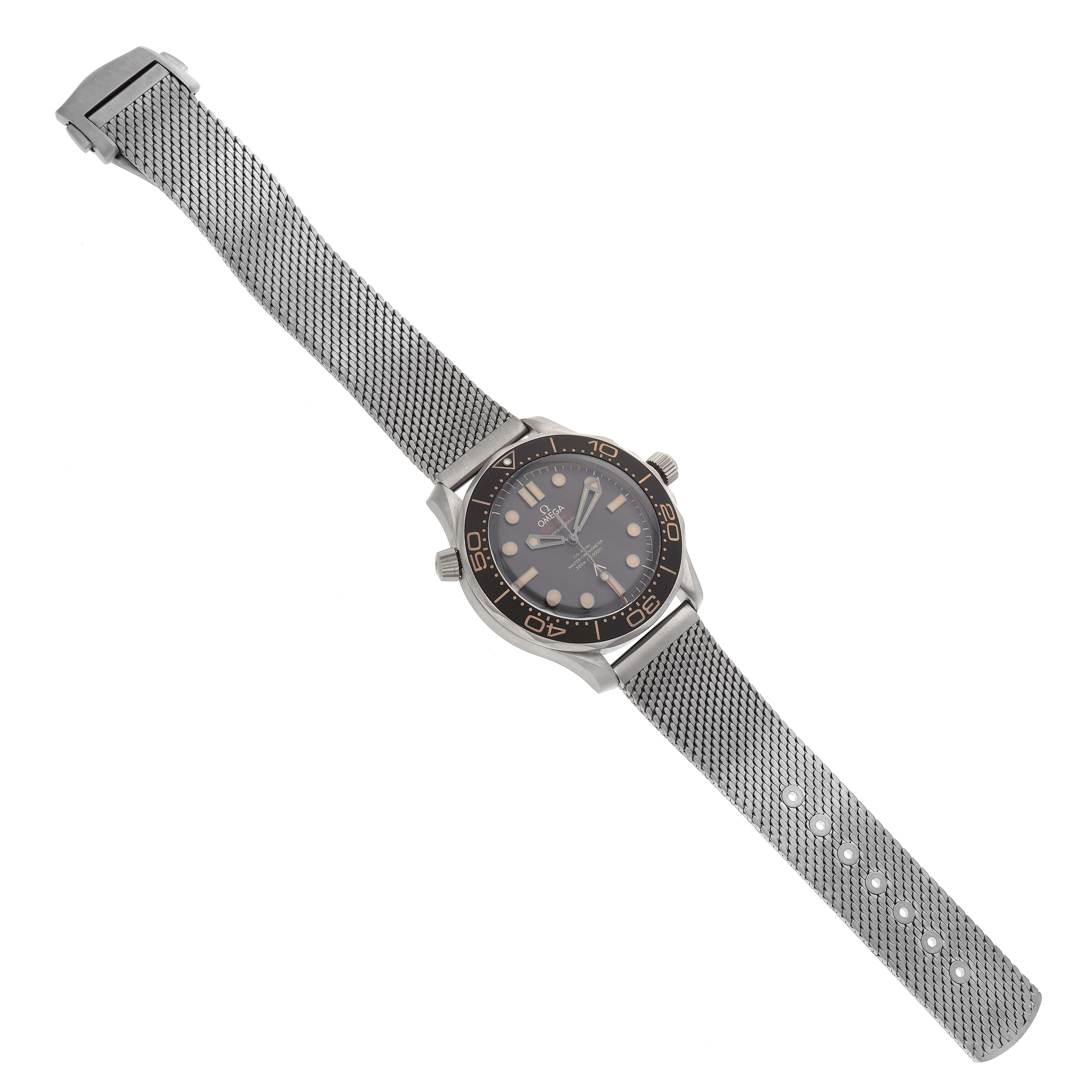 The Omega Seamaster 210.90.42.20.01.001 Men's Titanium Brown Dial 210.90.42.20.01.001 Men's Titanium Brown Dial watch is shown at a slight angle, displaying its full face, bezel, and stainless steel mesh strap.