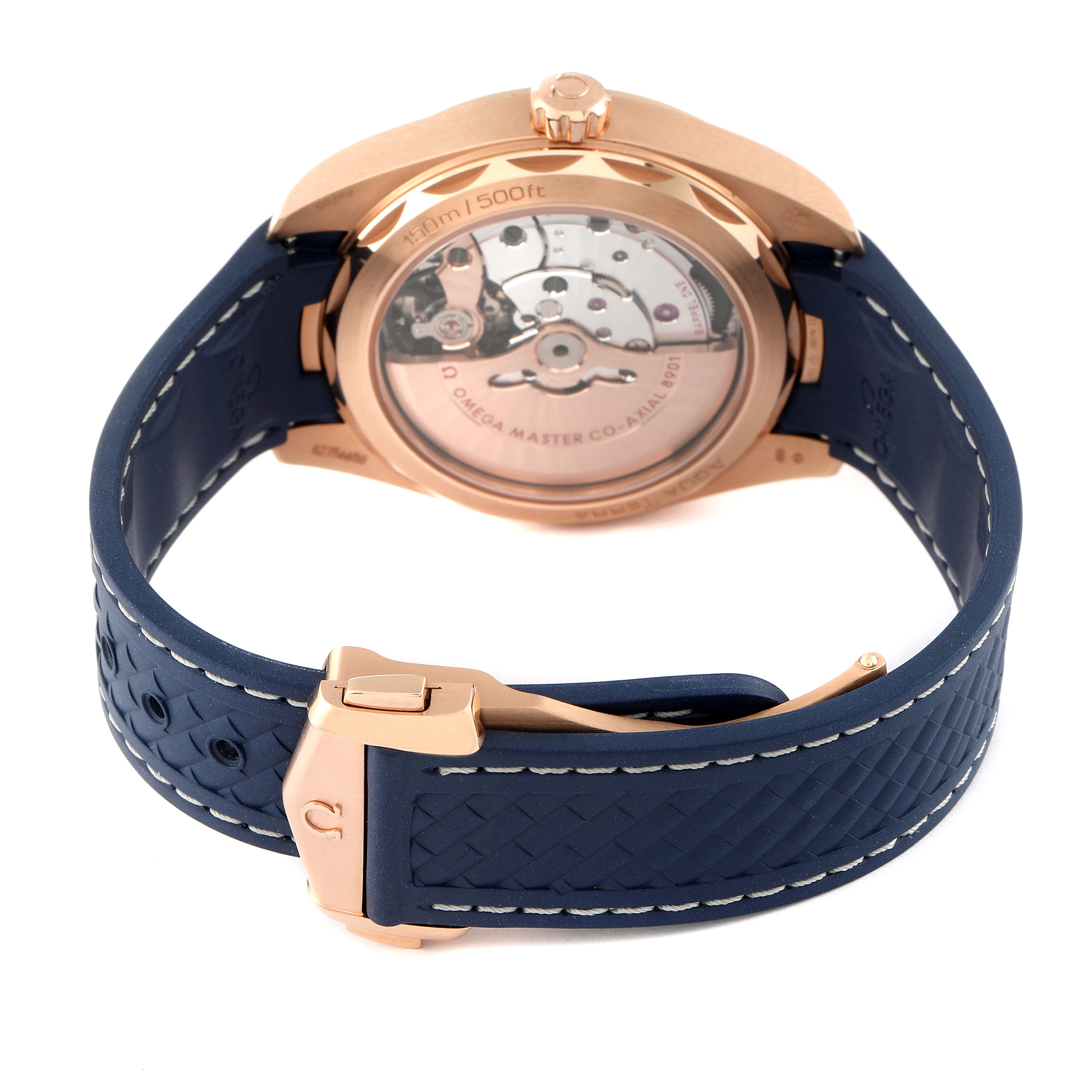 The image shows the back view of the Omega Aqua Terra 220.52.41.21.03.001 Men's Rose Gold Blue Dial 220.52.41.21.03.001 Men's Rose Gold Blue Dial watch, highlighting its movement and blue strap.