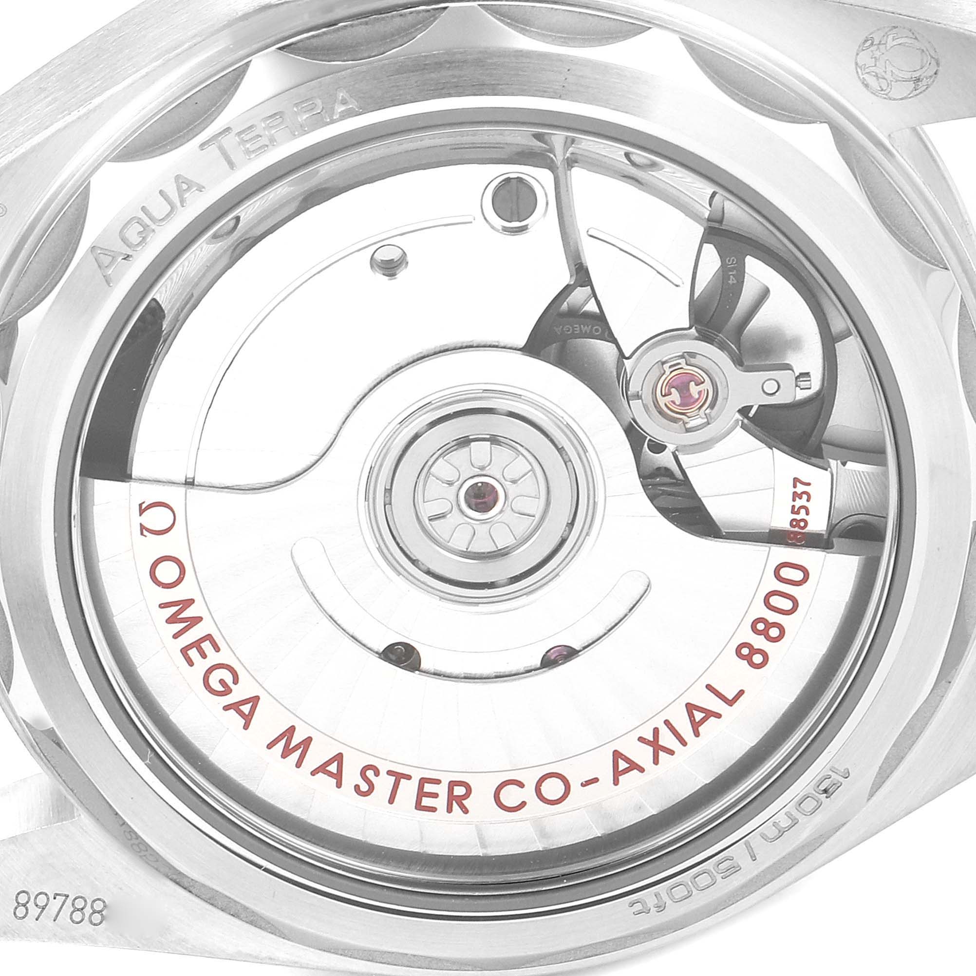 This image shows a close-up of the Omega 220.10.34.20.02.002 Women
s Stainless Steel Silver Dial 220.10.34.20.02.002 Women
s Stainless Steel Silver Dial Seamaster Aqua Terra Steel Ladies Watch 220.10.34.20.02.002 revealing the inner mechanism with the branding.