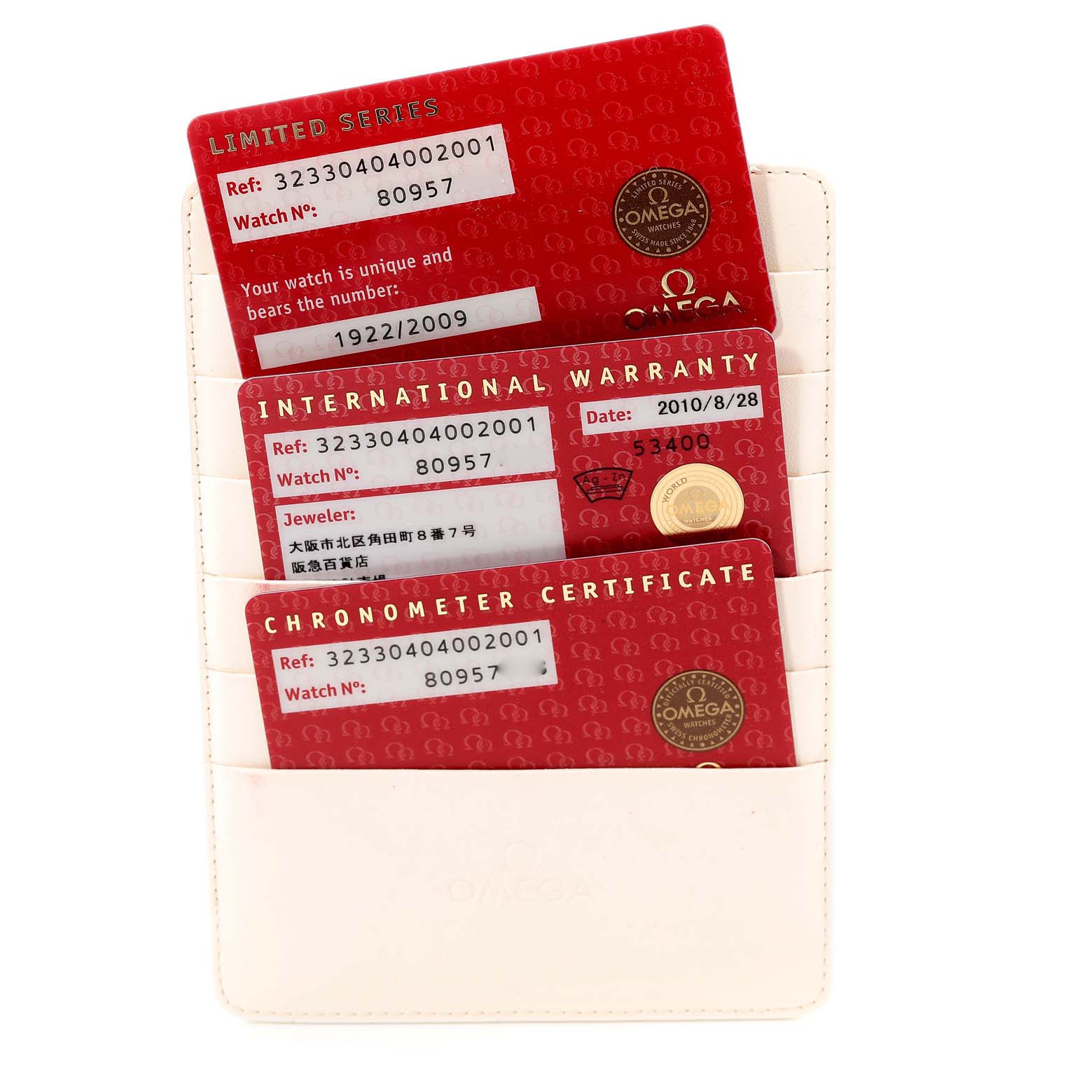 The image shows three official cards for the Omega Speedmaster 323.30.40.40.02.001 Men's Stainless Steel White Dial 323.30.40.40.02.001 Men's Stainless Steel White Dial model: Limited Series, International Warranty, and Chronometer Certificate.