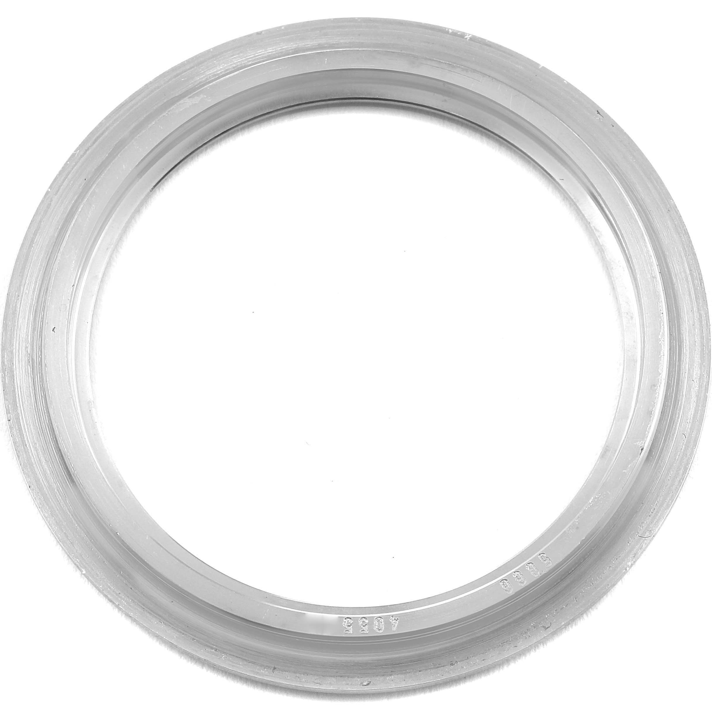 This image shows the bezel of a Patek Philippe Aquanaut 5066A Men
s Stainless Steel Black Dial 5066A Men
s Stainless Steel Black Dial watch from a top-down angle.