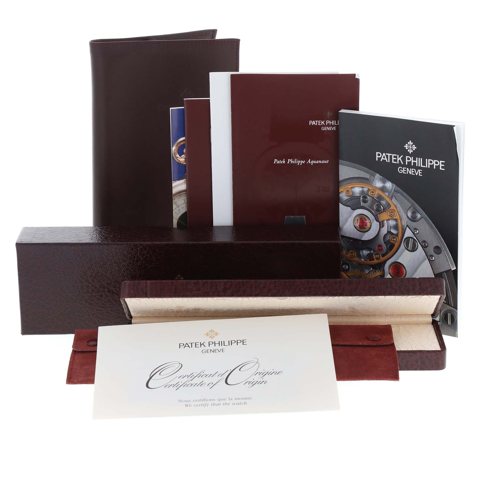 The image shows the Patek Philippe Aquanaut 5066A Men
s Stainless Steel Black Dial 5066A Men
s Stainless Steel Black Dial model
s packaging and accessories, including manuals, a certificate, and a leather case, viewed from the front.