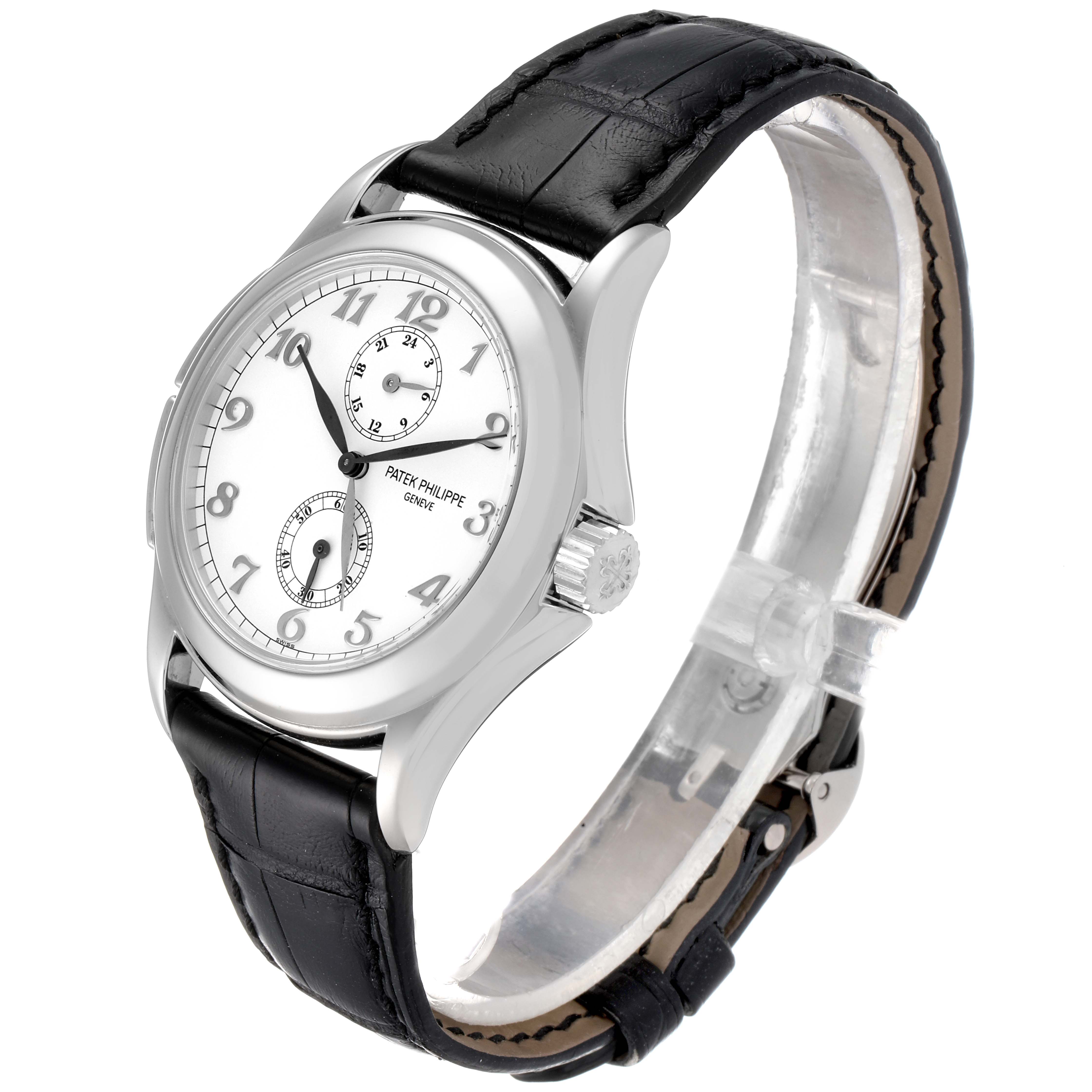 This image shows a Patek Philippe Calatrava 5134G Men's White Gold White Dial 5134G Men's White Gold White Dial watch angled from the front-right, detailing the face, crown, and leather strap.