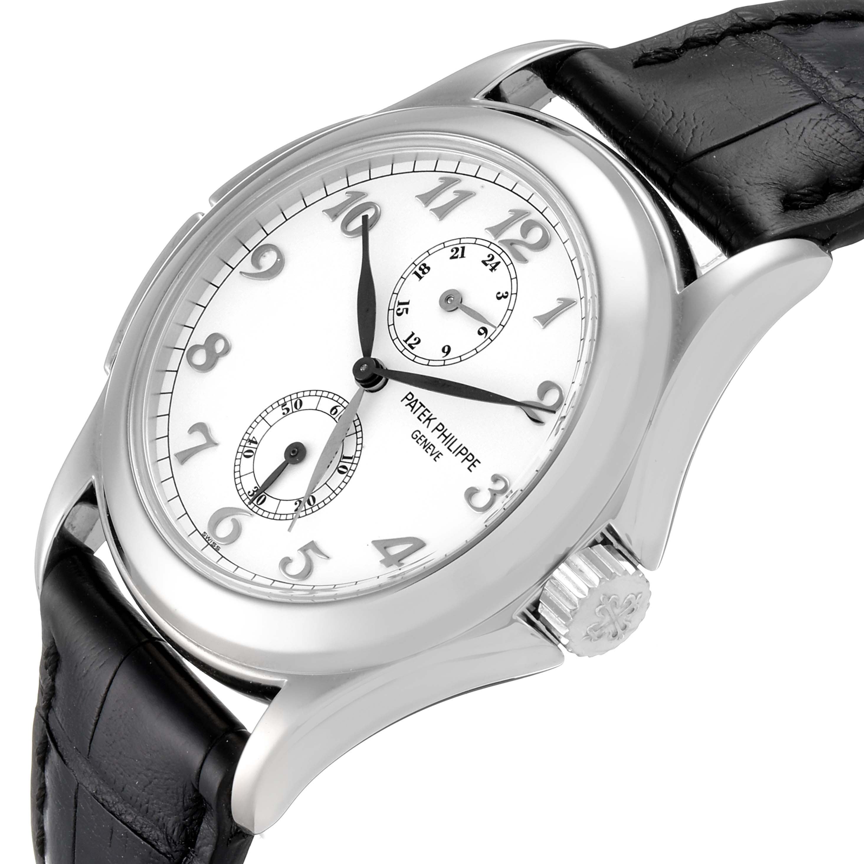 The image shows a Patek Philippe Calatrava 5134G Men's White Gold White Dial 5134G Men's White Gold White Dial watch at an angled view, displaying its face, crown, and leather strap.