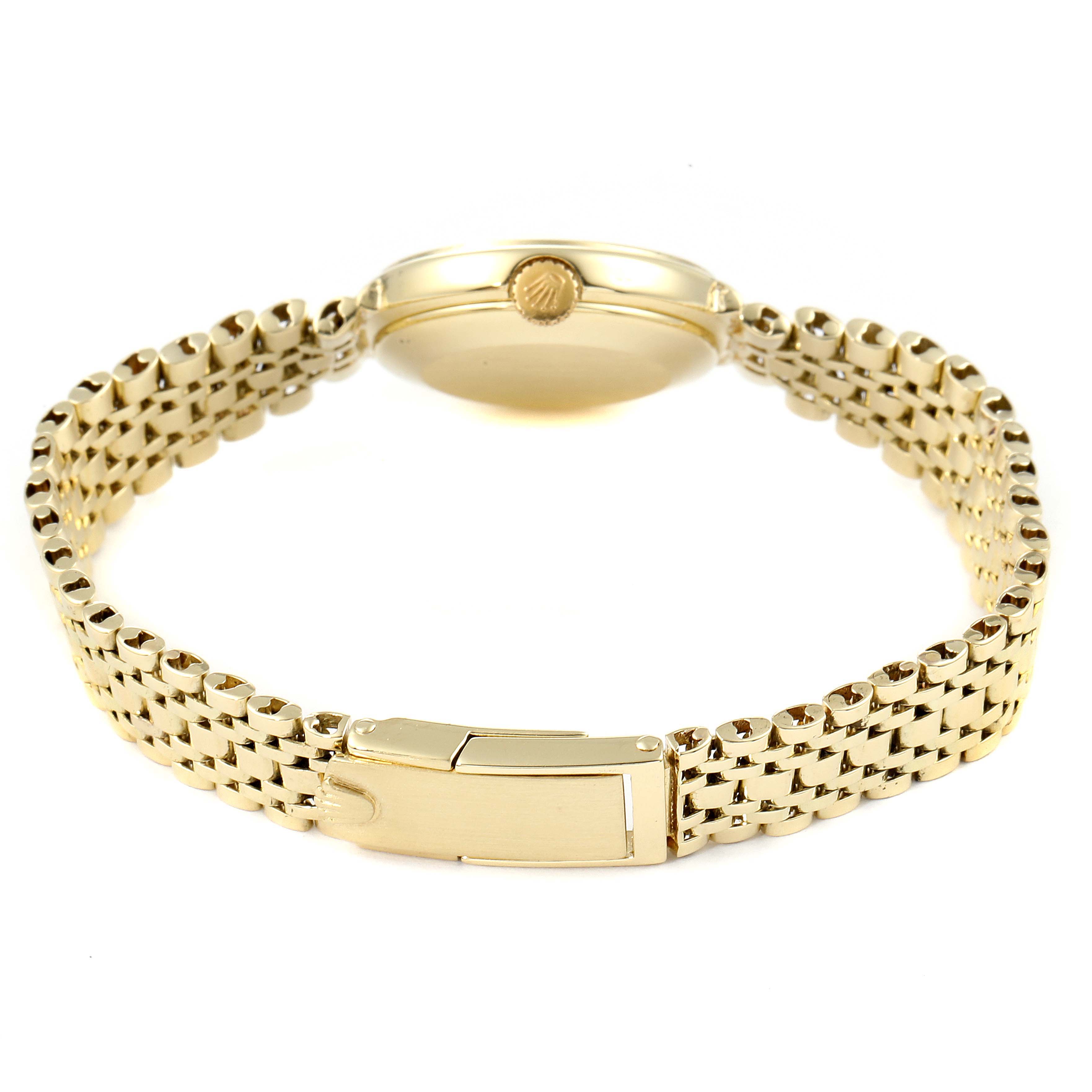 This image shows the back case, side crown, and clasp of the gold Rolex Cocktail  Women's Yellow Gold Silver Dial  Women's Yellow Gold Silver Dial model watch.